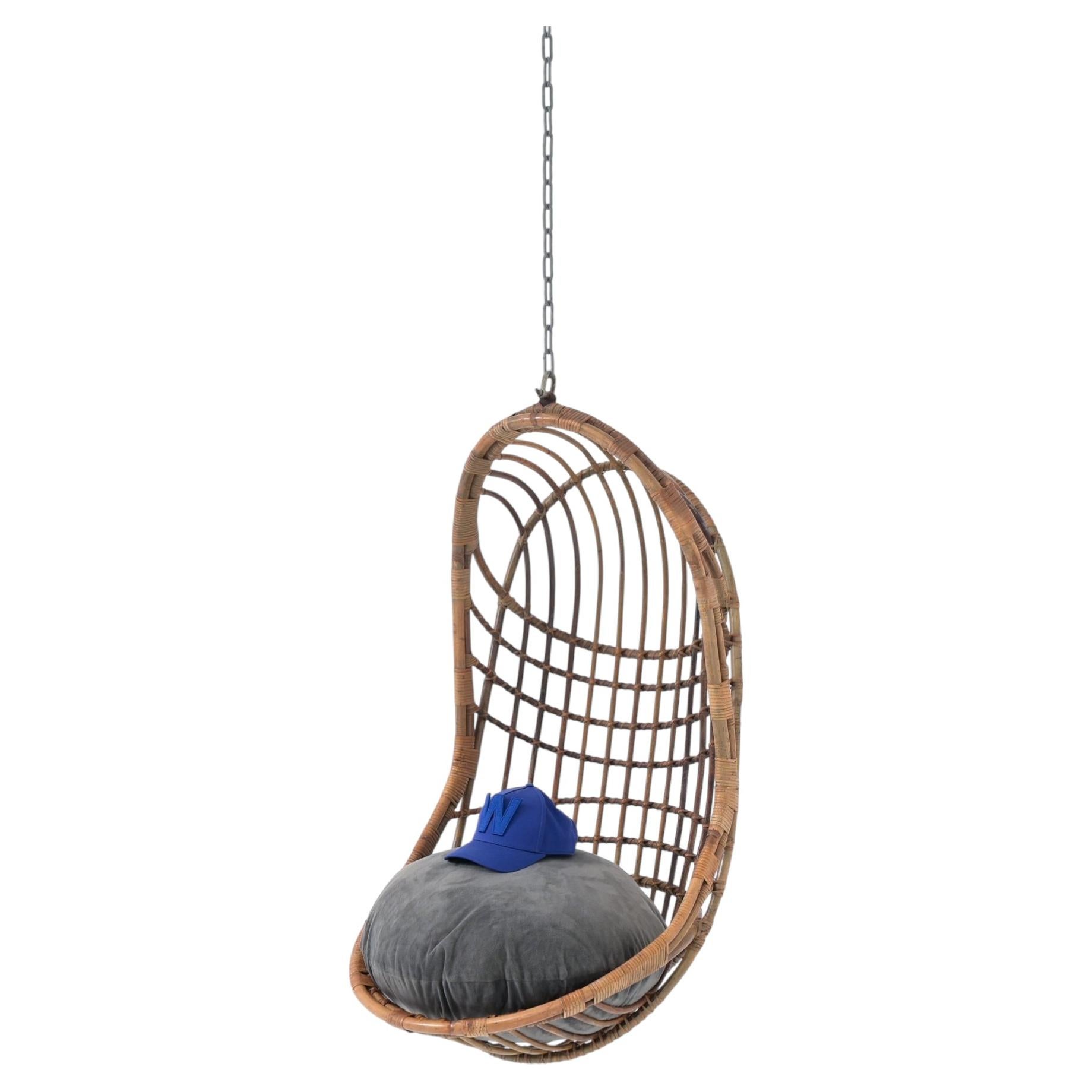 Fauteuil suspendu en rotin en forme d'œuf