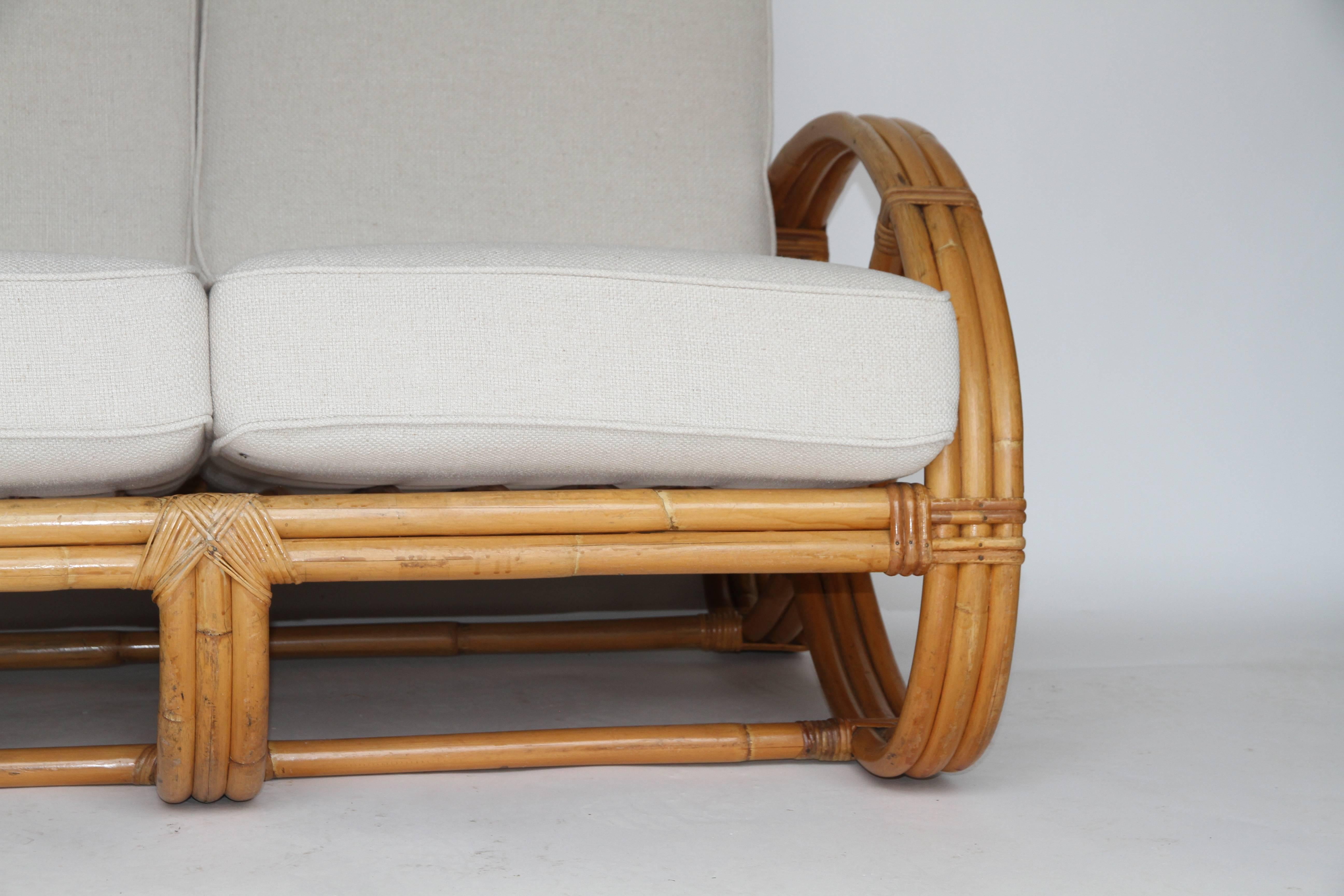 20th Century Rattan Pretzel Loveseat in the Style of Paul Frankl