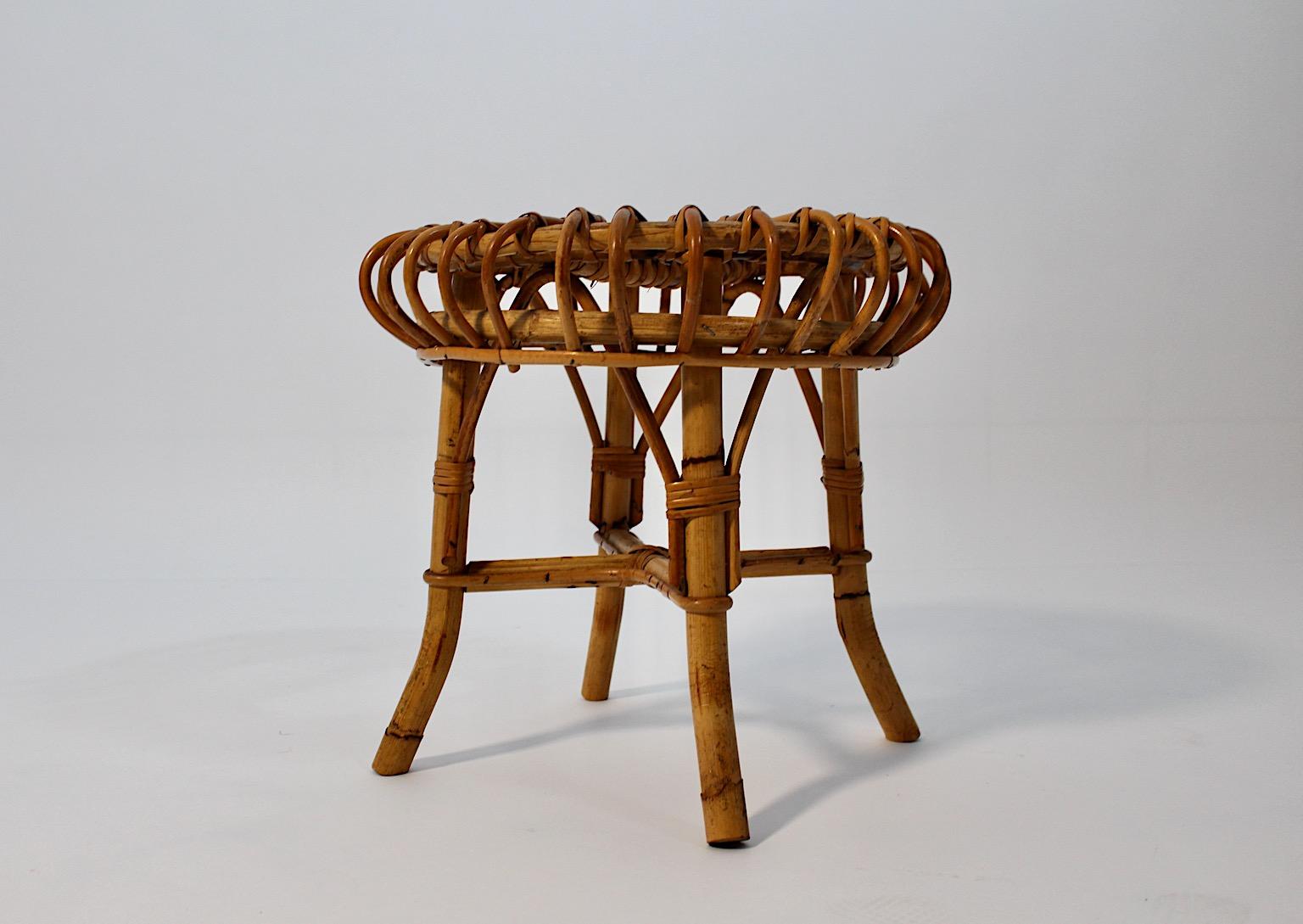 Mid-Century Modern vintage organic stool in circular shape from rattan Italy 1950s.
A stunning stool from rattan network circular like in very good condition with minor signs of age and use.
Stable and sturdy
This rattan stool could perfectly