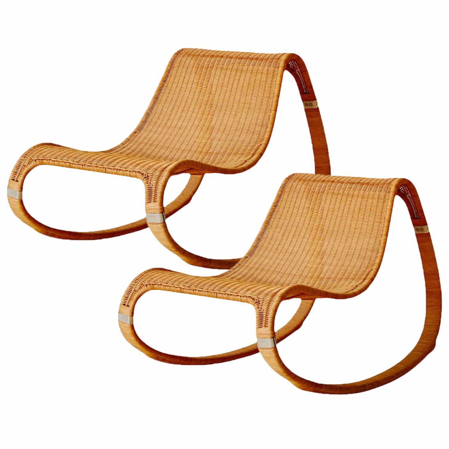 This beautiful hand-woven rattan rocking chair was designed by James Irvine (1958-2013) for Ikea in 2002. The beautiful organic curved lines with the chrome accents make this chair a stylish modern Classic. Brand sticker Ikea present.

In very good