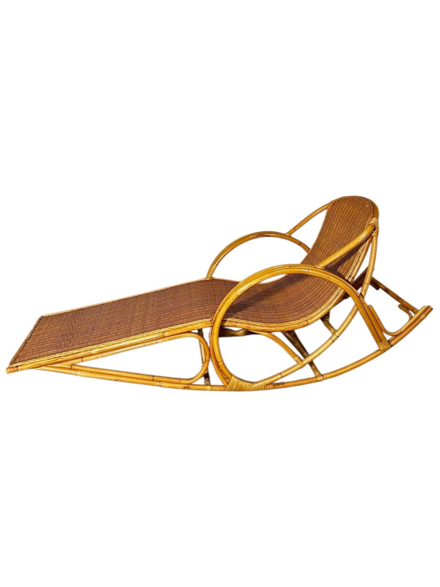 Rattan Rocking Chaise Lounge Chair, 1970’s.  Label on back. Original
Measures 40” tall 88.5” long 33.5” deep, seat height 15.25” seat depth 60”