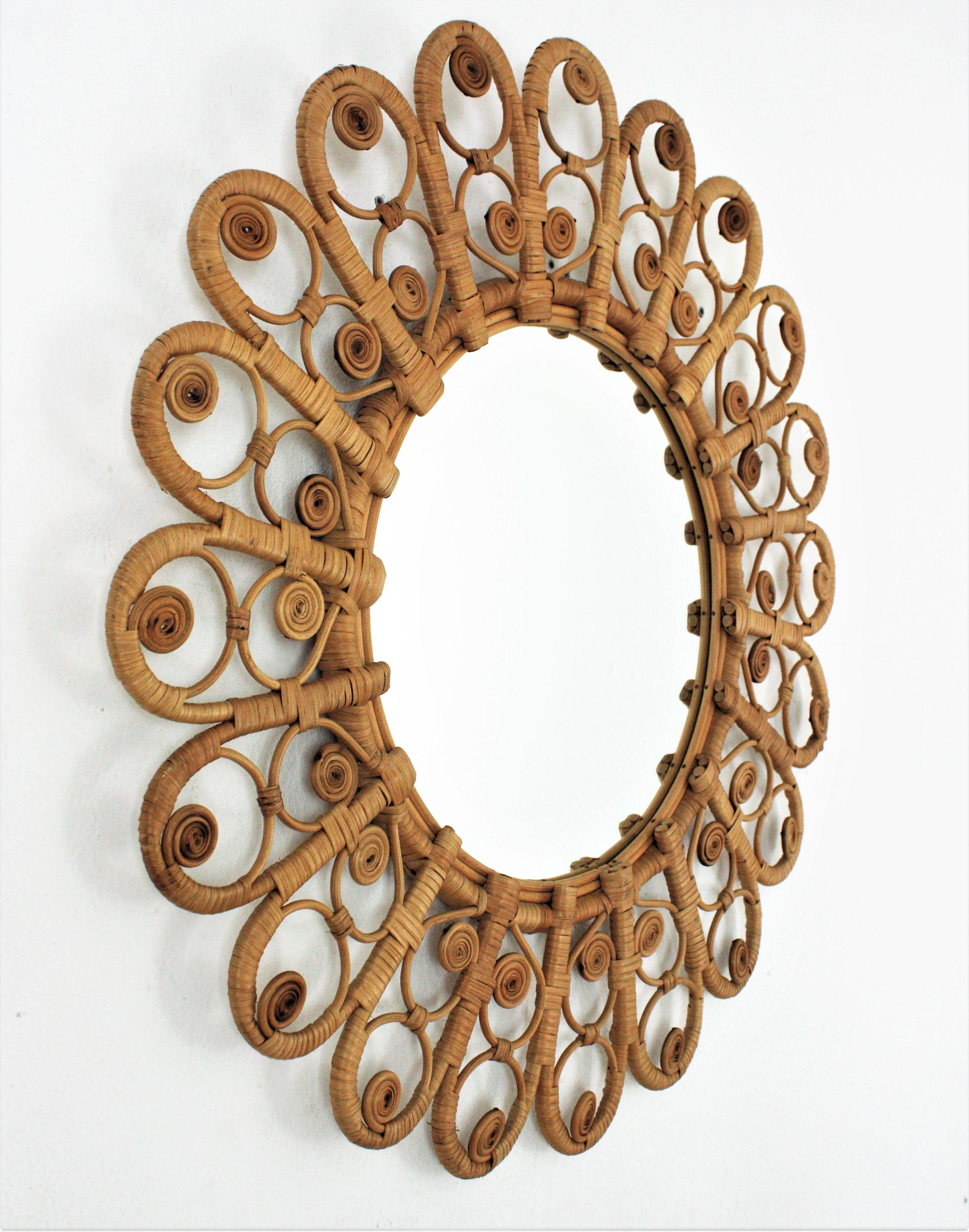 Hand-Crafted Rattan Sunburst Mirror with Filigree Peacock Frame, Spain, 1960s For Sale