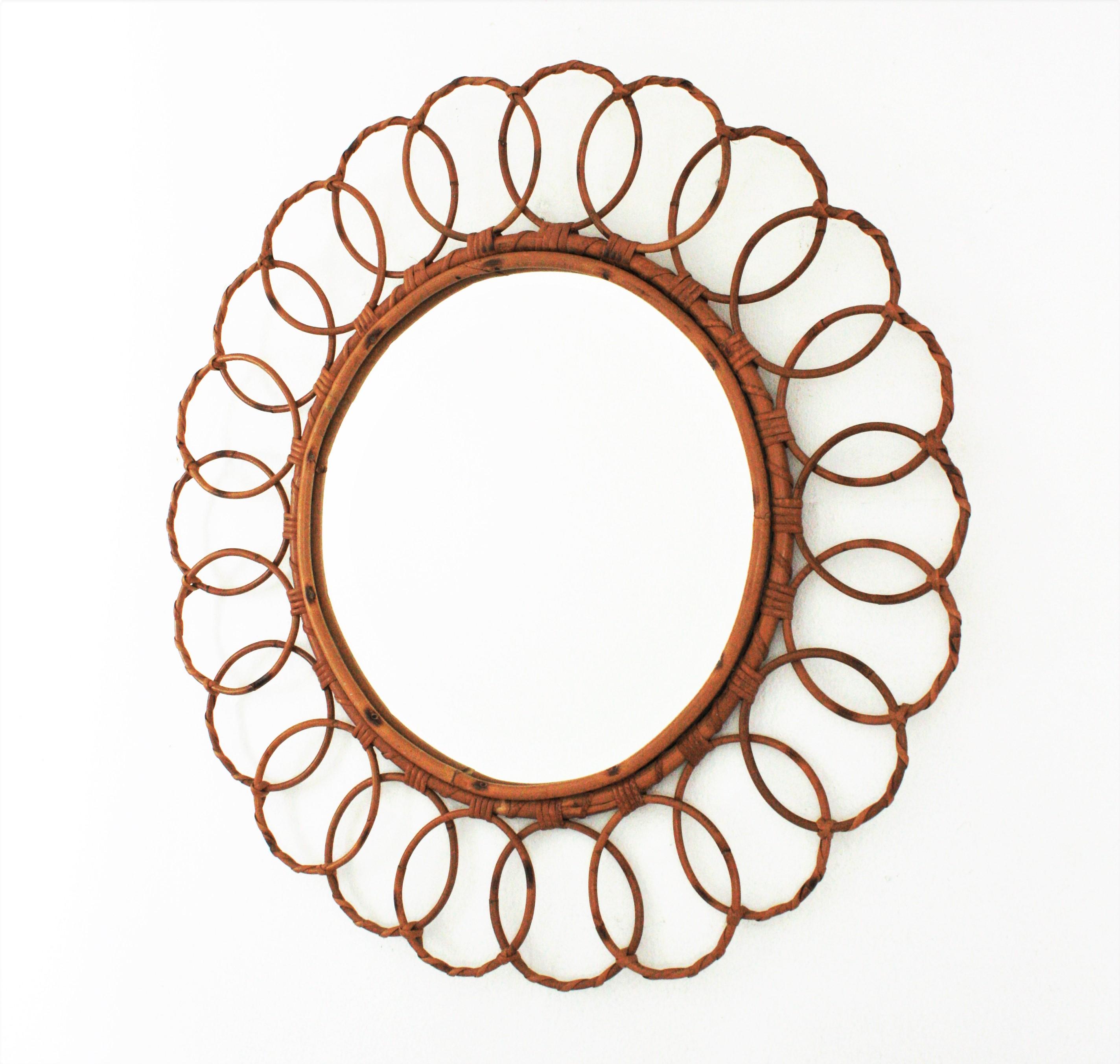 Handcrafted rattan mirror, Spain, 1960s
This round mirror has all the taste and freshness of the Mediterranean style, it combines a bohemian and midcentury taste and it would be a nice choice for a beach house or countryside house decoration but