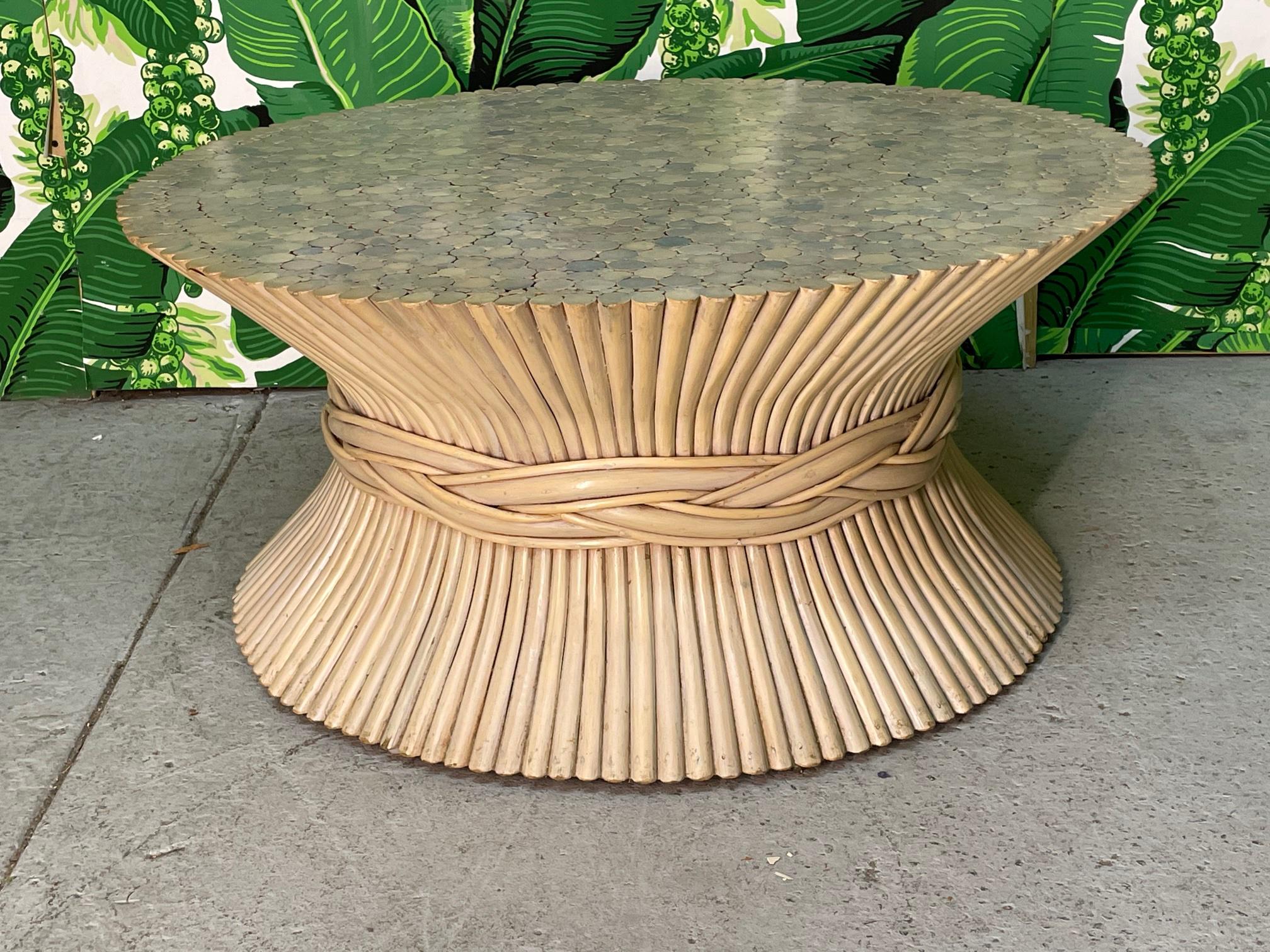 Rattan coffee or cocktail table in the iconic sheaf of wheat motif in the manner of McGuire. Good condition with minor imperfections consistent with age.
  
   