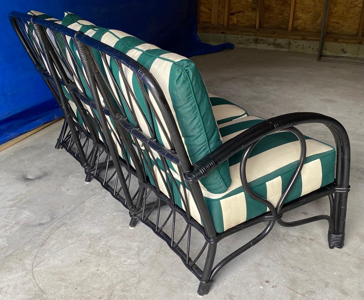 American Rattan Sofa and 2 Matching Lounging Arm Chairs For Sale