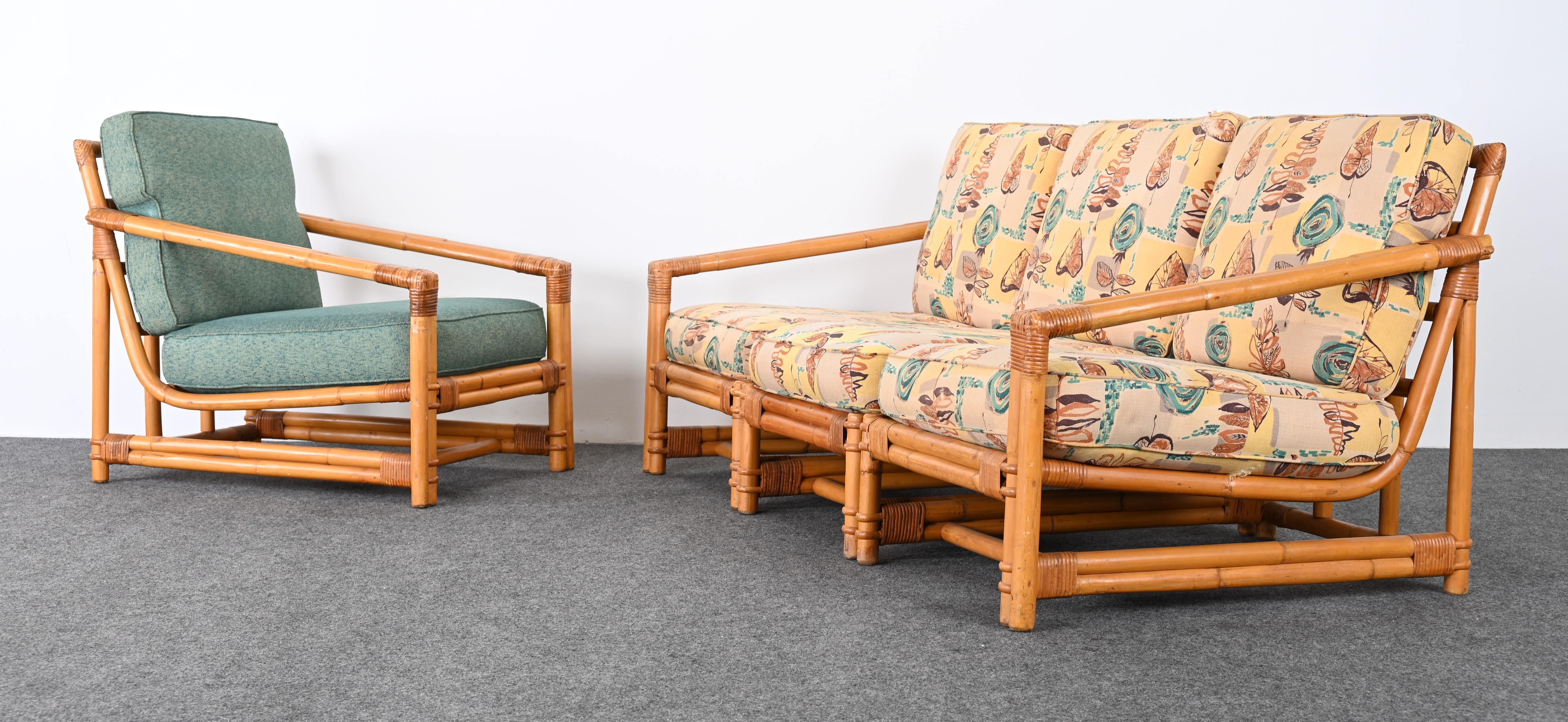 A Mid-Century Modern Rattan sofa and armchair. This set would look great on a covered sun porch or sunroom. The chair and sofa would work well in a beach house or lake house. Also would work well in a Mid Century Modern home or interior and has the