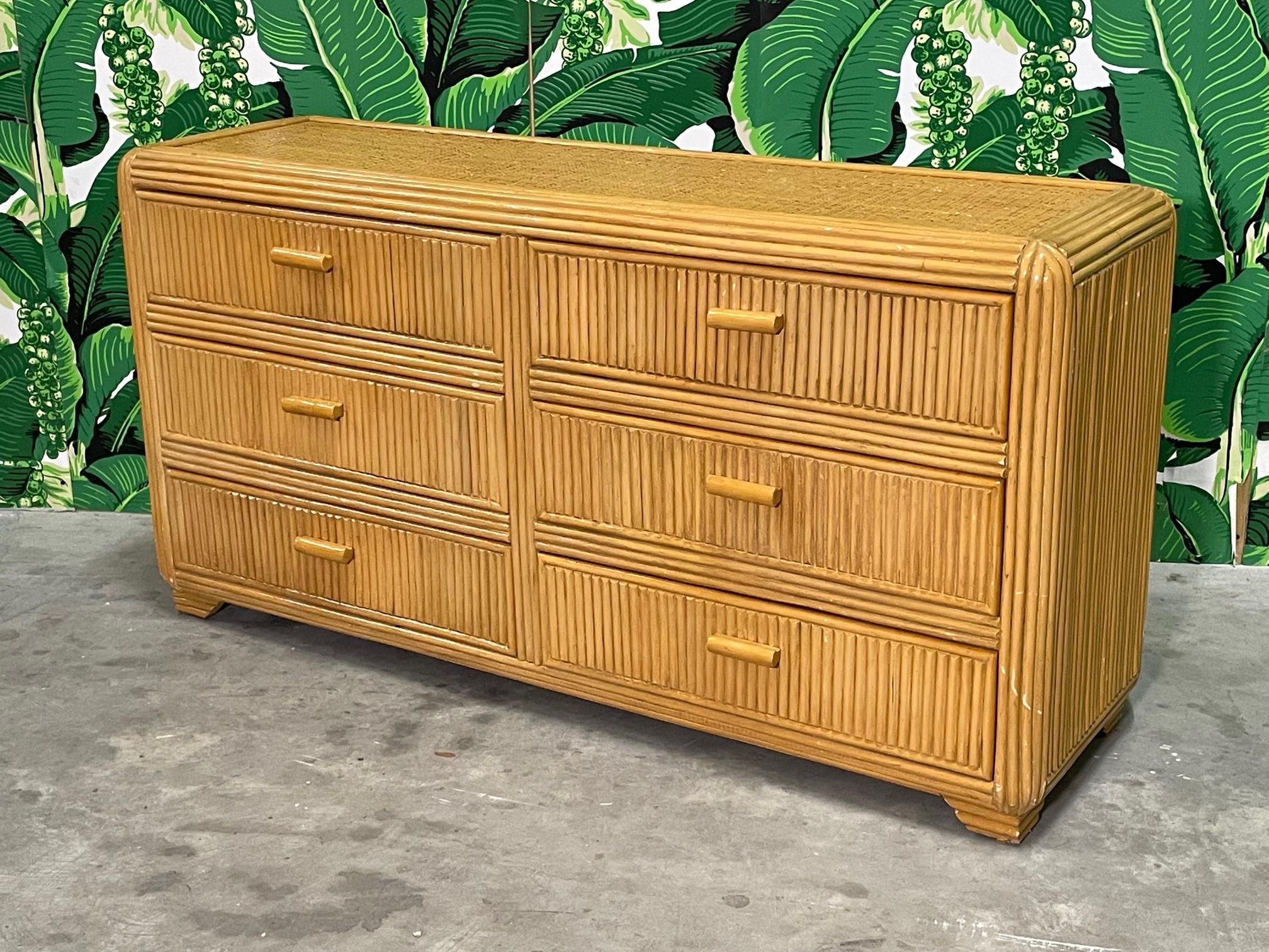 Split reed rattan veneered double dresser features a beautiful blonde finish and will add a perfect touch of organic modern style to any room. Good vintage condition with minor imperfections consistent with age (see photos).

 