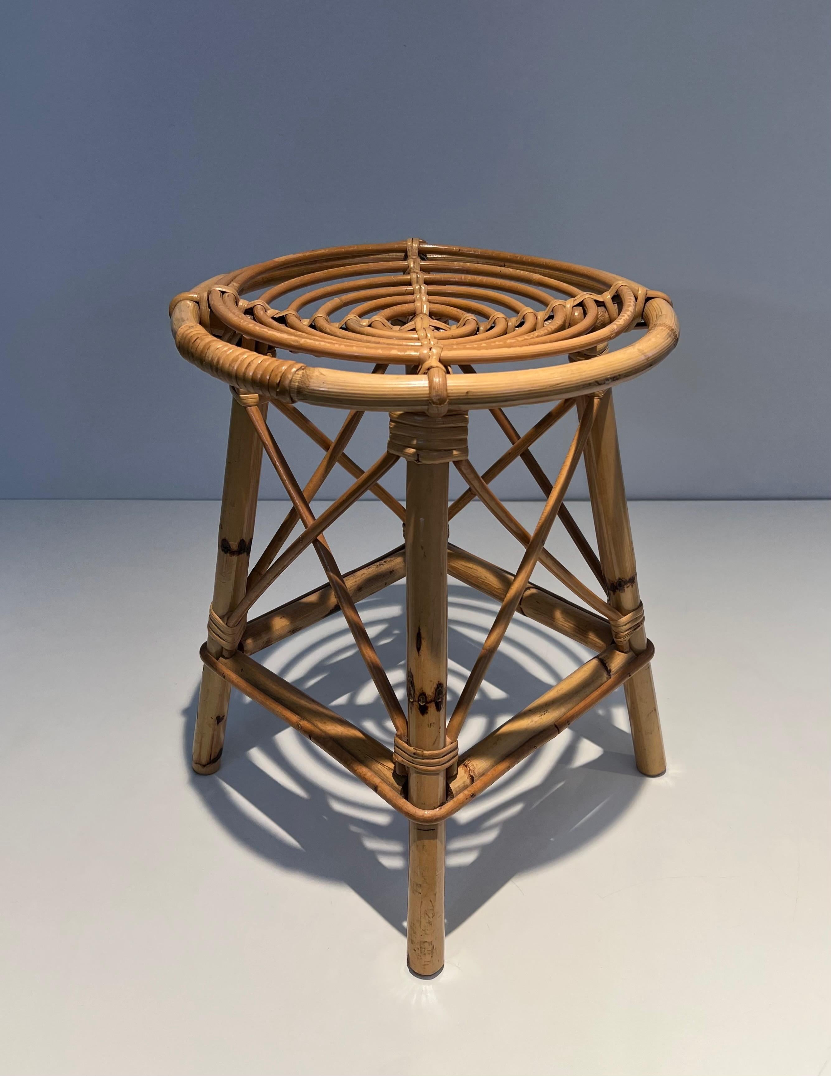 This very nice and decorative stool is made of rattan and bamboo. This is a French work. Circa 1970