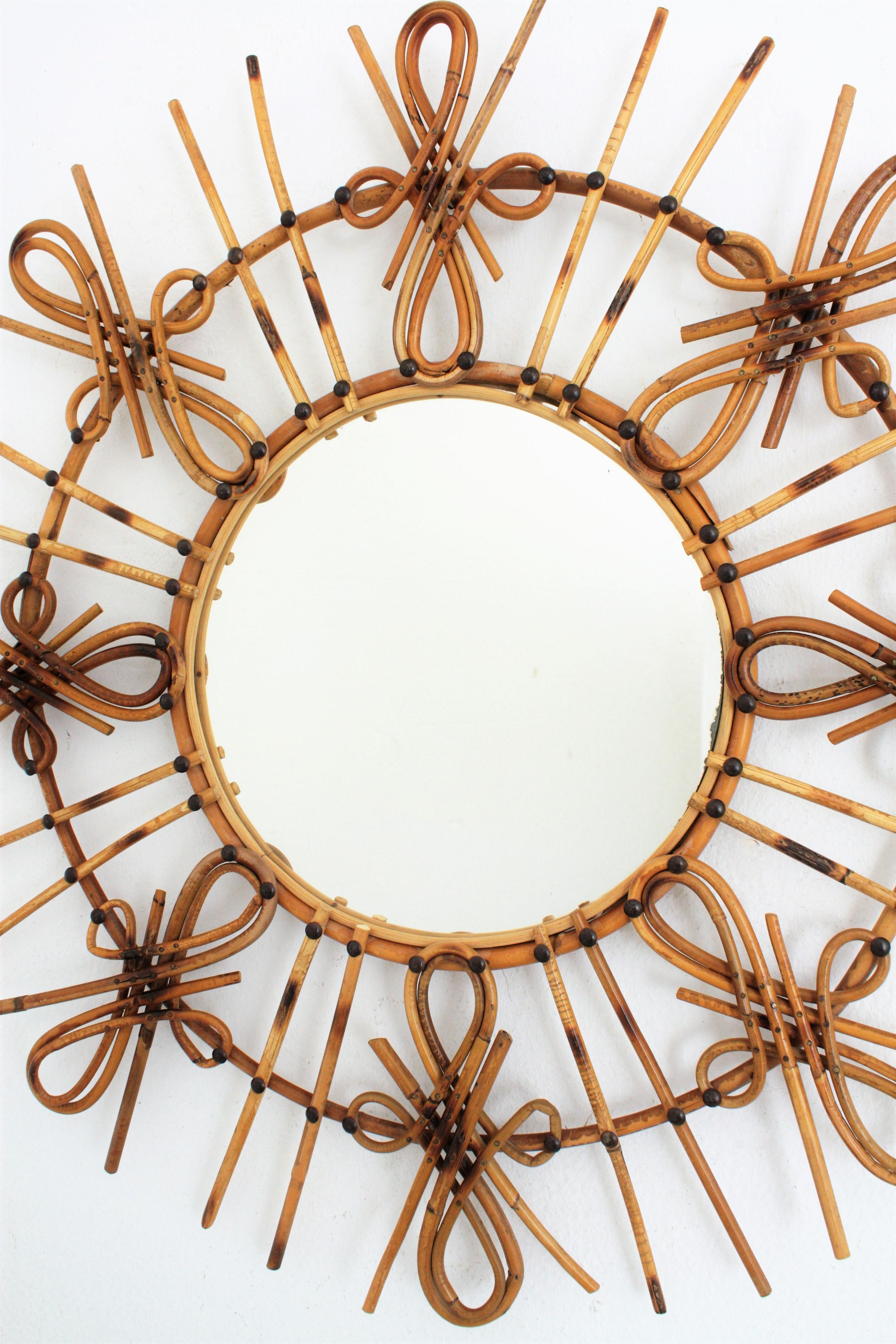 Wicker Rattan Sunburst Mirror with Chinoiserie Tiki Accents, Spain, 1950s For Sale