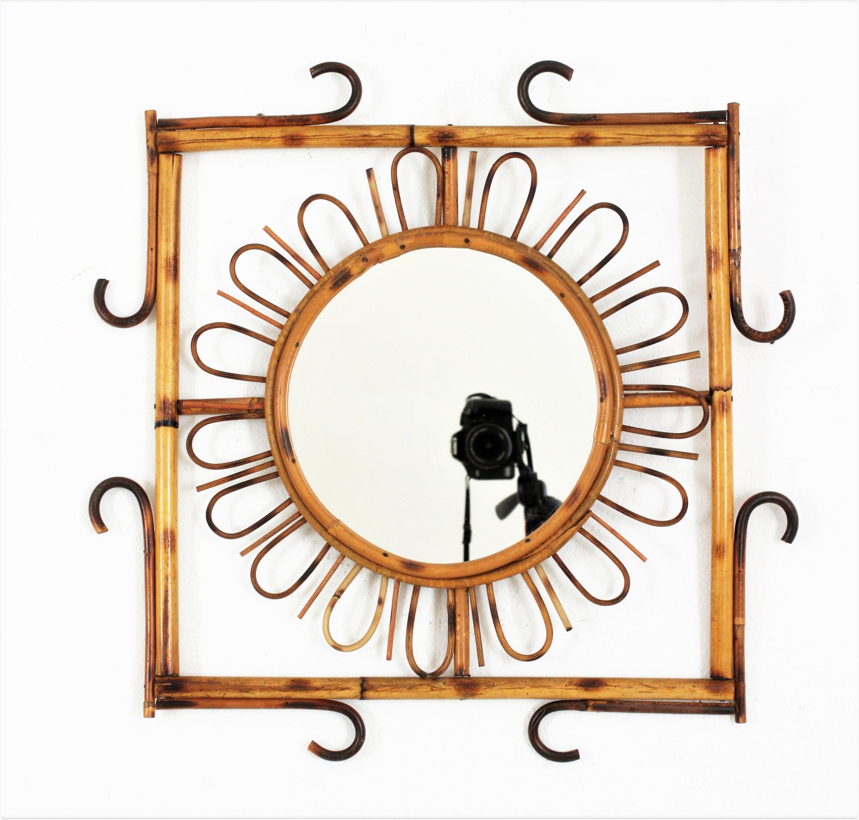 Handcrafted Mediterranean style rattan sunburst rhombus framed mirror, Spain, 1960s.
This rattan mirror can be placed in two positions, as a rhombus or as a square. It will be a nice choice for a beach house or countryside house decoration or to