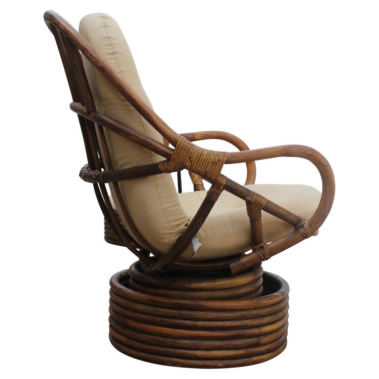 Rattan Swivel Rocking Lounge Chair with Ottomans at 1stDibs