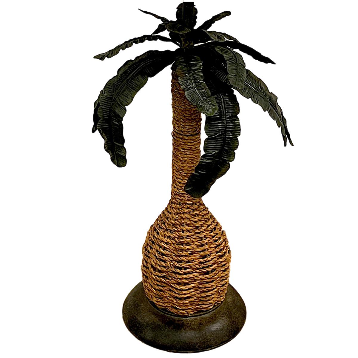 A circa 1980's rattan table lamp with tole leaves.

Measurements:
Height of body: 21