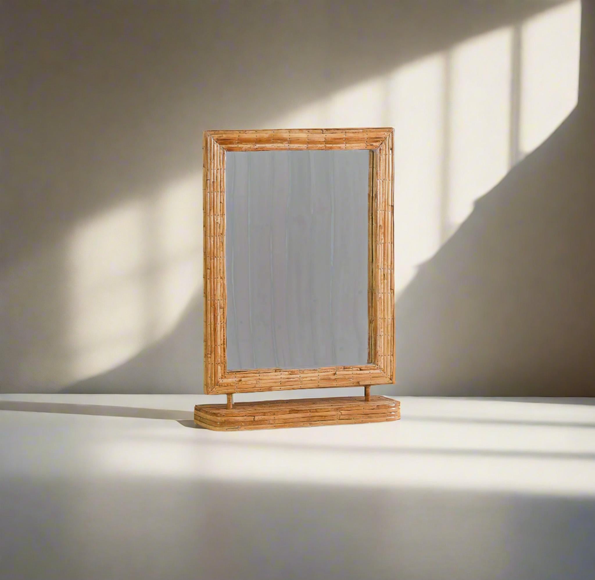 This lovely vintage style rattan vanity mirror is handcrafted using natural rattan, giving it a warm and unique texture. Its rectangular shape adds a touch of elegance to any room. Bring a touch of nature into your daily routine with this lovely