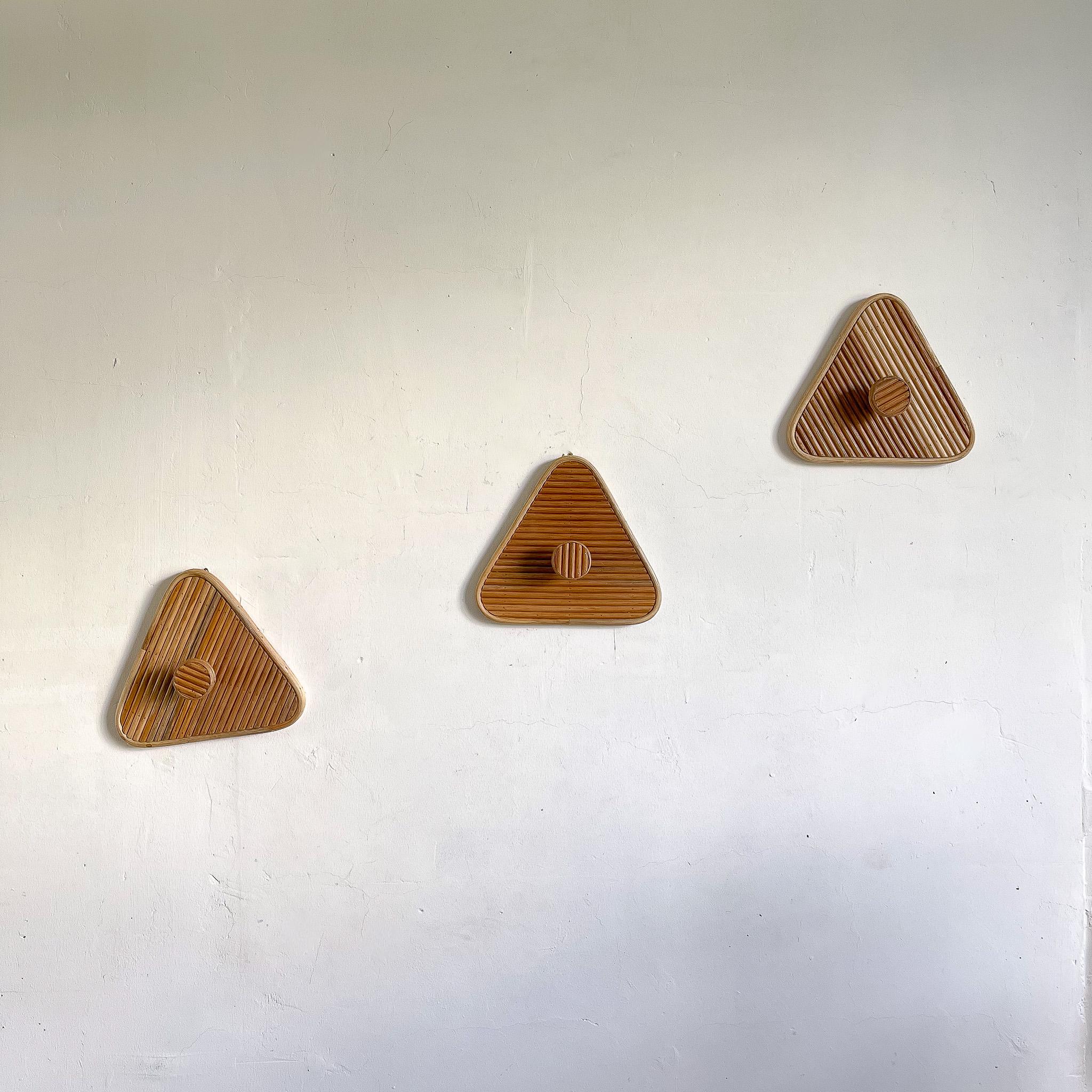 This elegant Triangle Shaped Rattan Wall Hook is the perfect addition to any room. Its mid-century Italian design in a rattan core with a triangle shape is ideal for entryways, bathrooms, and in kid's bedrooms. Installation is simple, and its modern