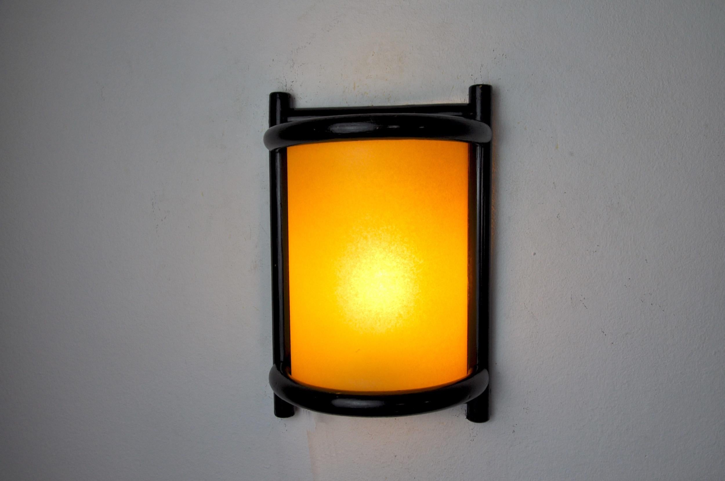 Very beautiful rattan wall lamp with a black lacquered finish, designated and produced in france in the 1960s.

A classic design that will illuminate your interior perfectly.

Verified electricity, time mark consistent with the age of the