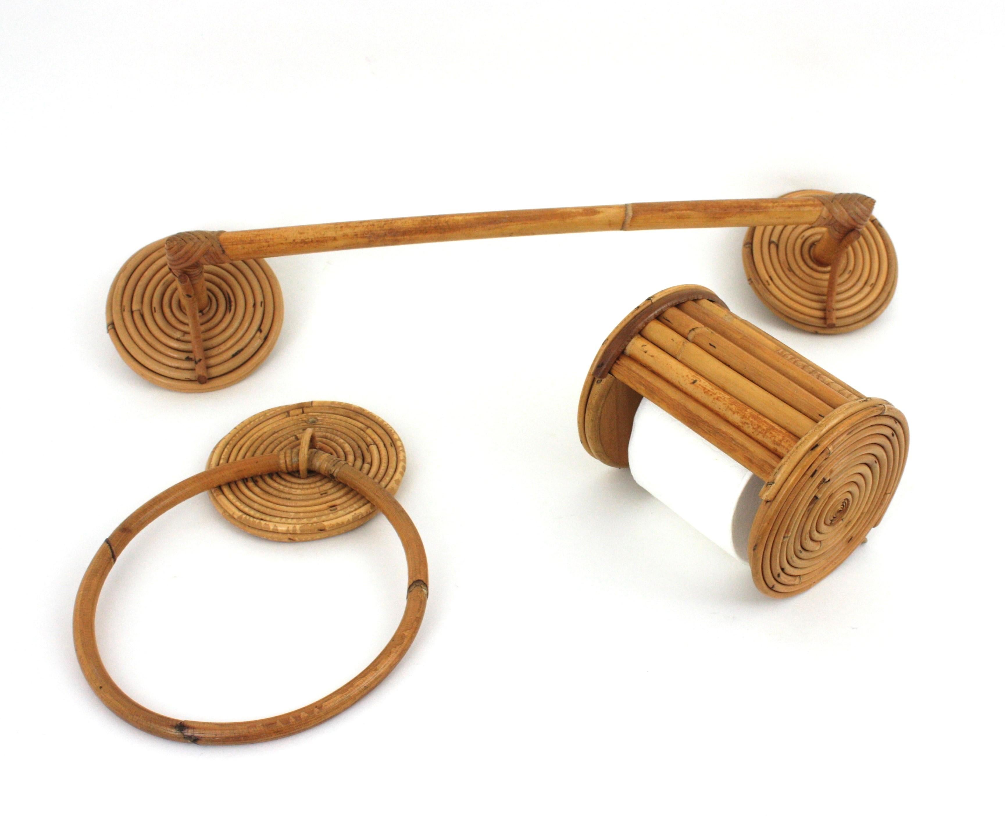 Set of Bathroom Wall Fixtures, Rattan
Spain, 1950-1960

This vintage set of bathroom accessories handcrafted in rattan / bamboo and wicker is comprised by a towel ring, a toilet paper holder and a towel rack.
On sale as a set.
Measures:
Towel Rack: