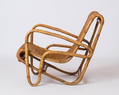Rattan & Wicker Armchair in the style of Joseph André Motte - France 1960's