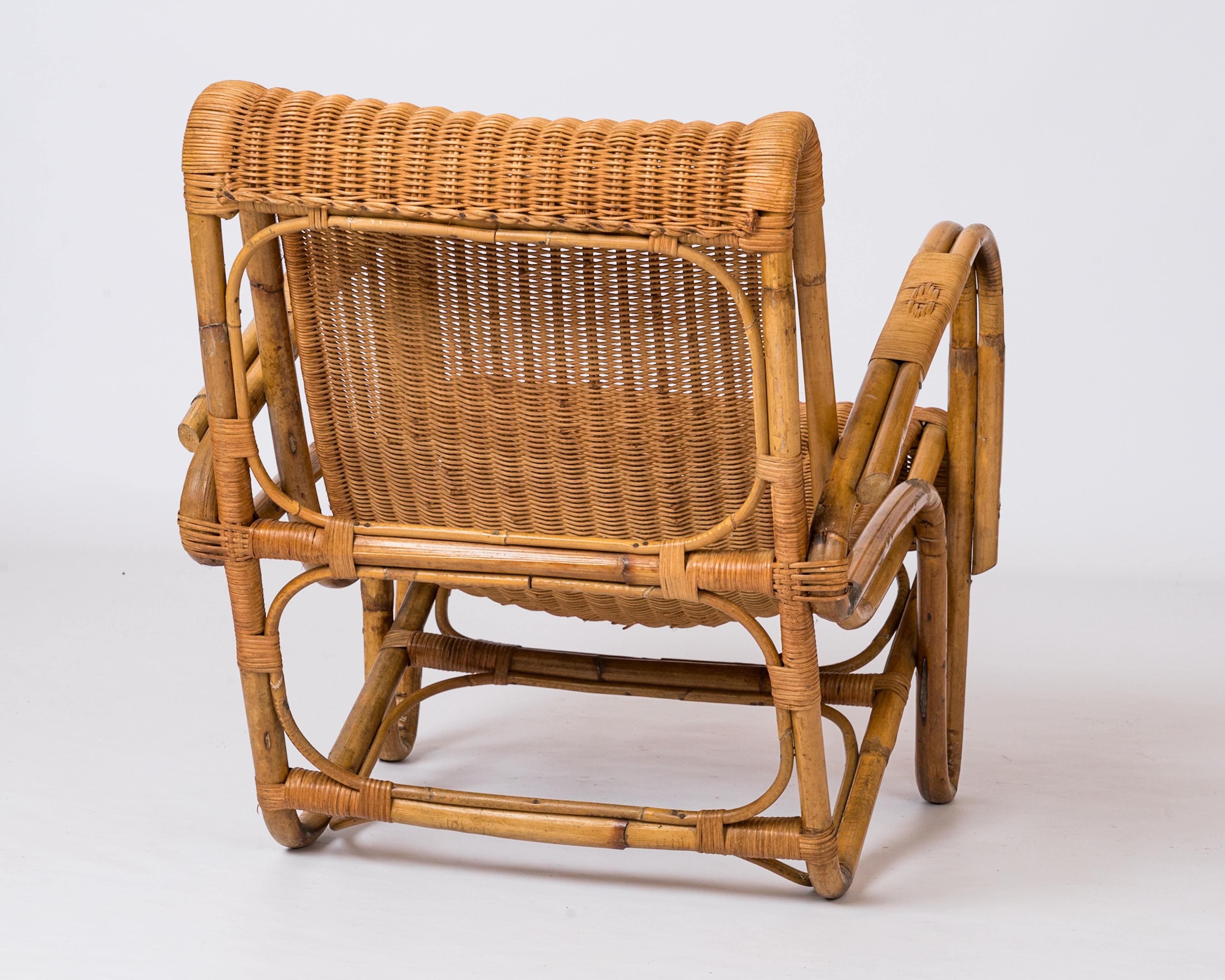 Mid-20th Century Rattan & Wicker Armchair in the style of Joseph André Motte - France 1960's For Sale