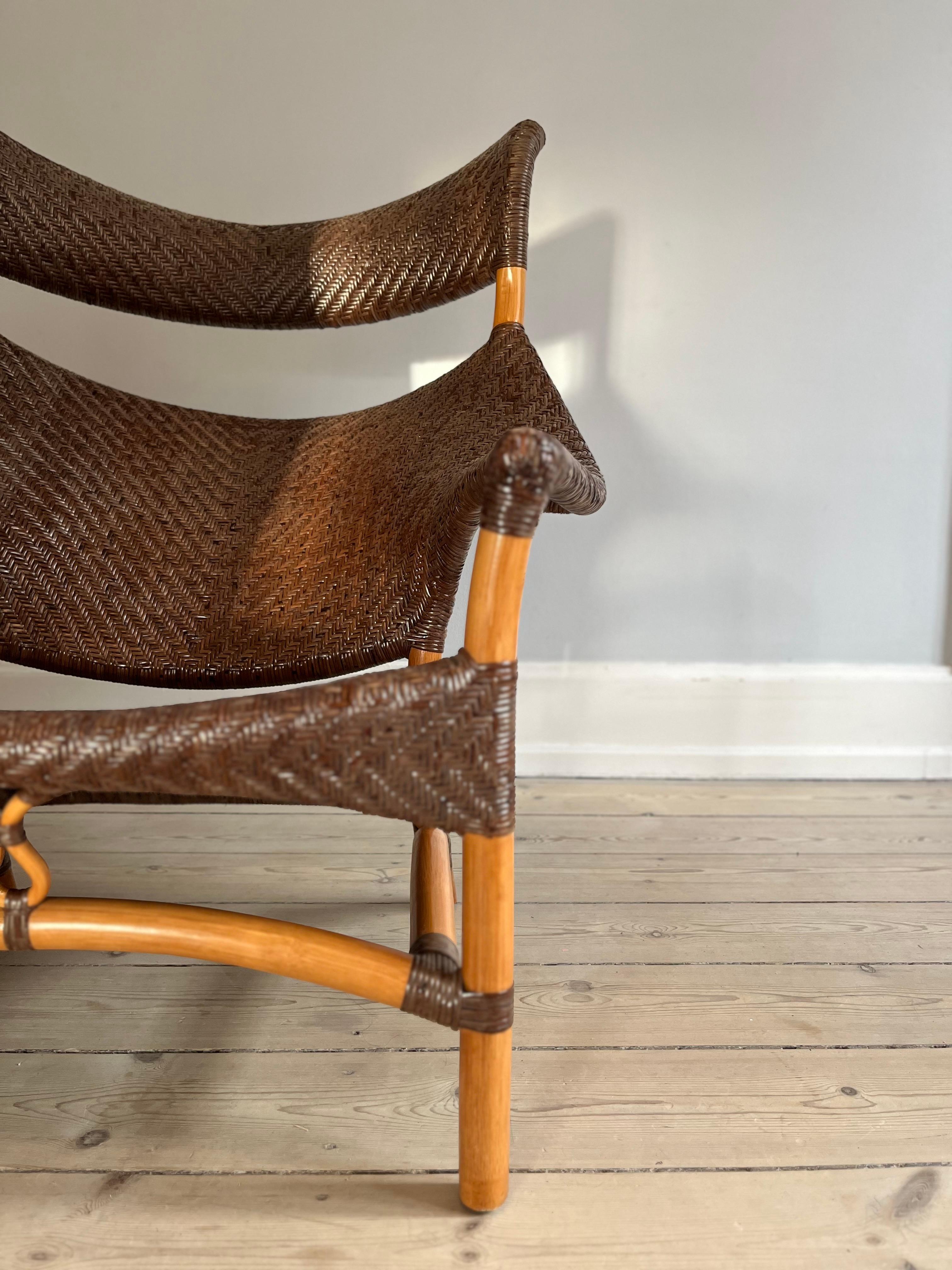 Sculpturel and functional ergonomic woven rattan and bamboo chair. 

Designed by Japanese designer, Yuzuru Yamakawa who shows his passion for the material and his life long work with designs in rattan.

A showcase of elegancy and sculpturel lines.