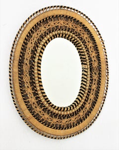 Espejo ovalado de mimbre tejido de ratán, años 70