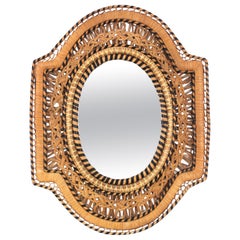 Specchio da parete in rattan e vimini con pavone in filigrana