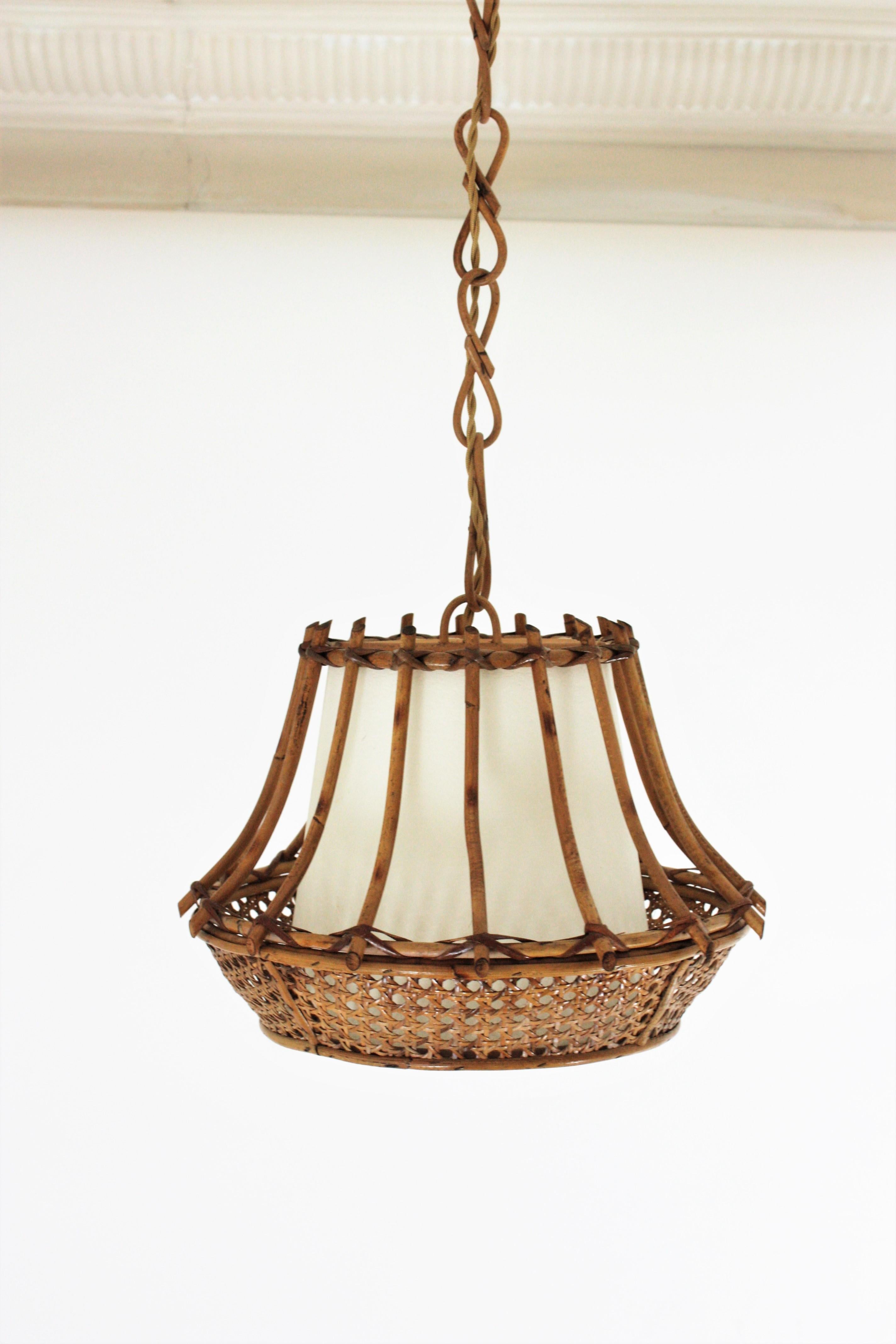 French Rattan Wicker Pagoda Pendant Light or Lantern For Sale
