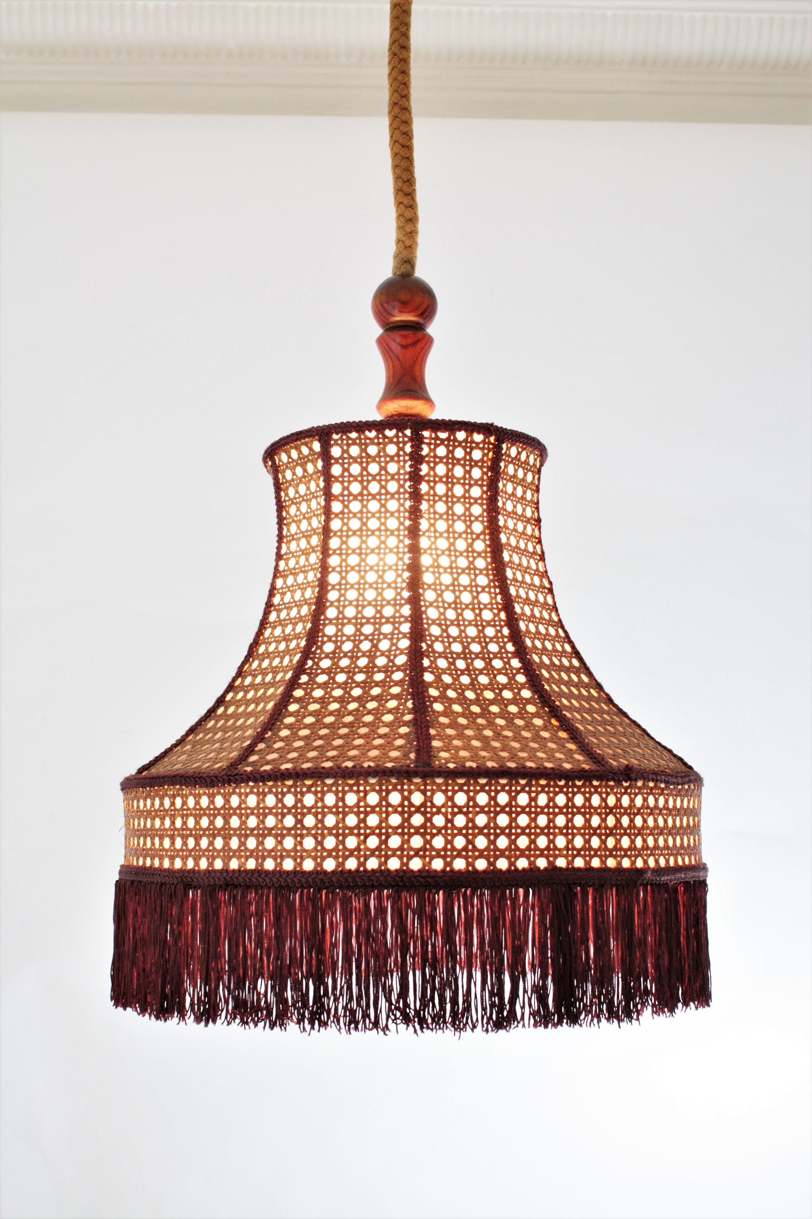 Mid-Century Modern Rattan Wicker Pendant Hanging Lamp with Pagoda Shape and Fringed Bottom