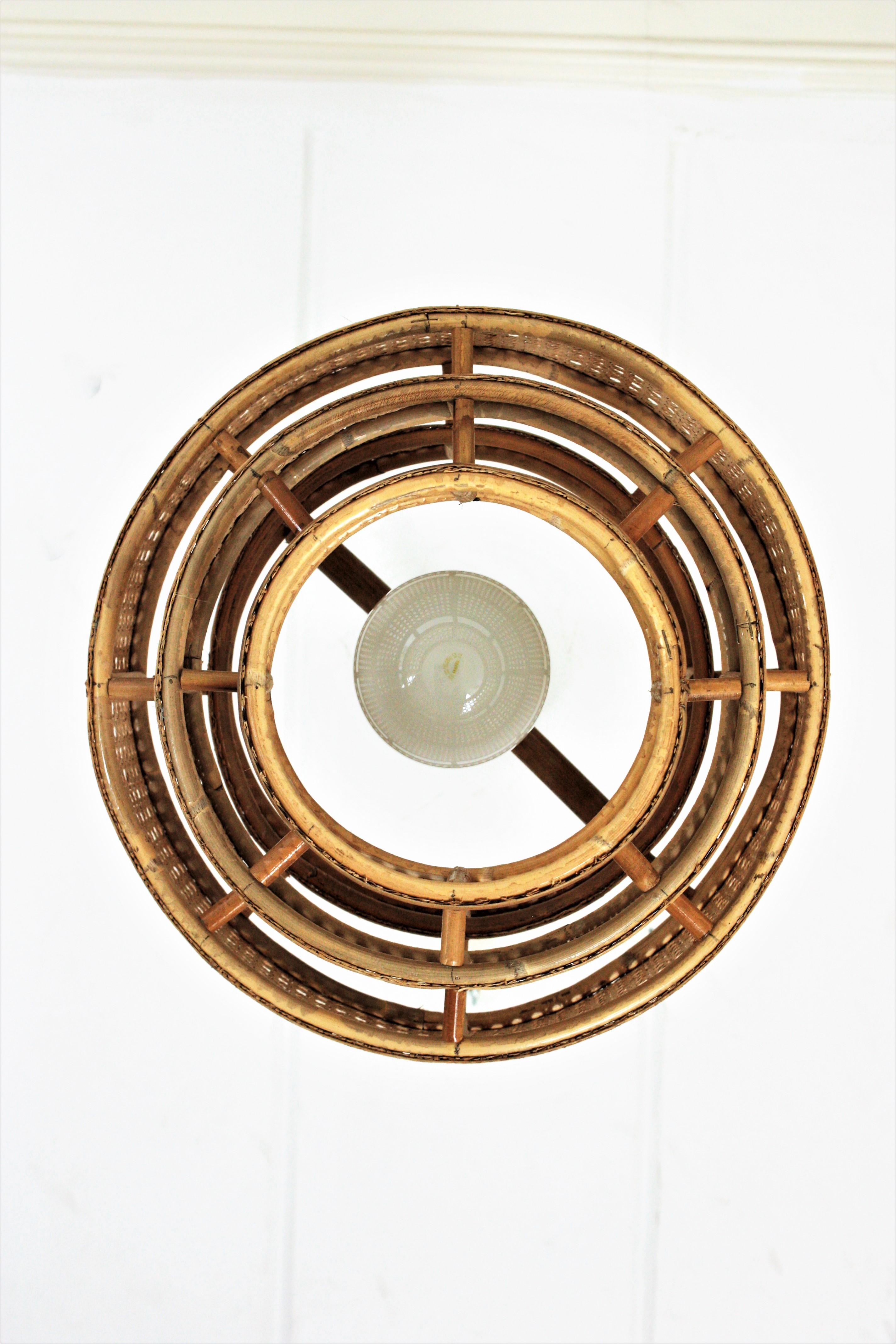  Rattan Wicker Weave Concentric Cylinder Pendant Hanging Light, 1960s For Sale 6