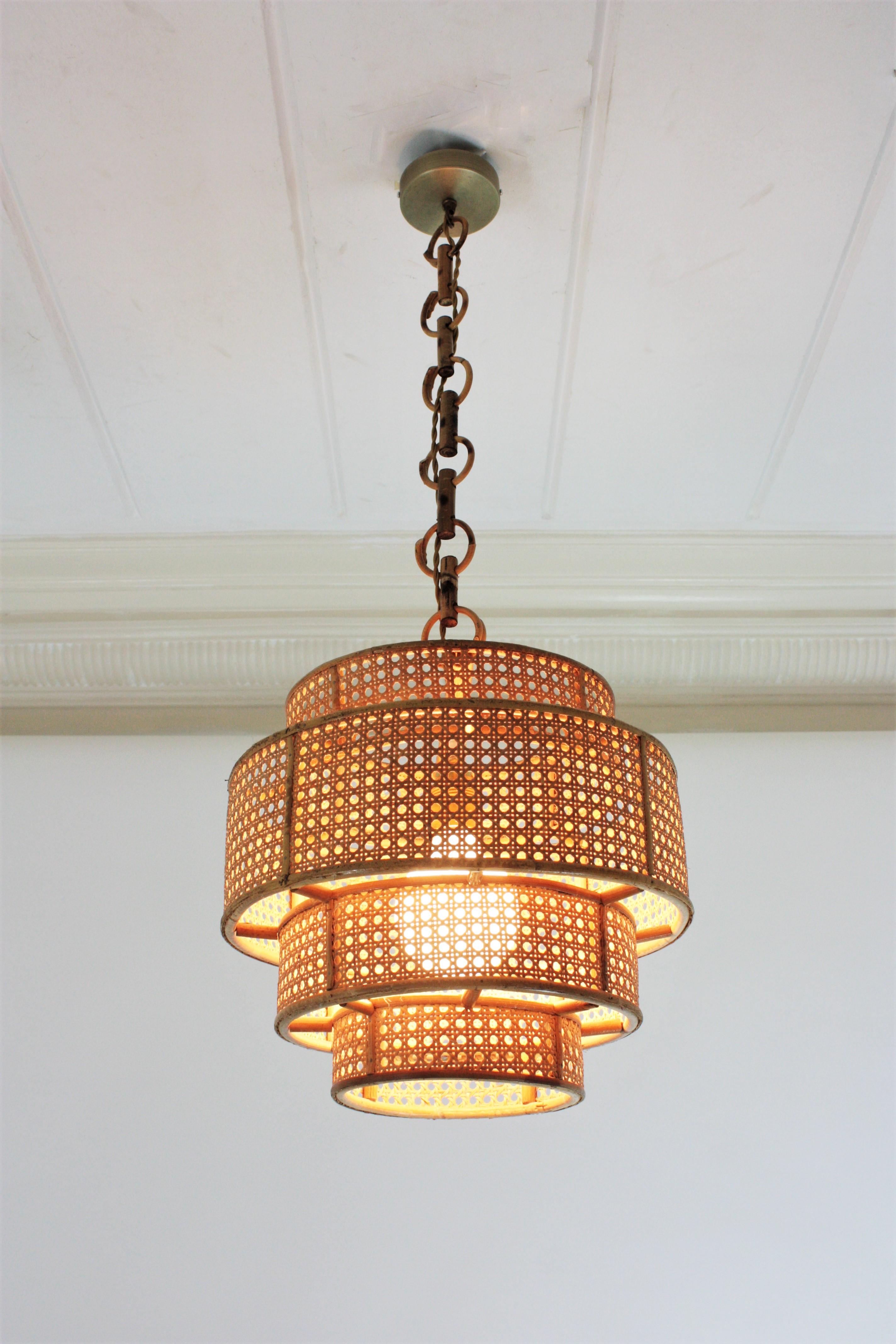 Italian  Rattan Wicker Weave Concentric Cylinder Pendant Hanging Light, 1960s For Sale