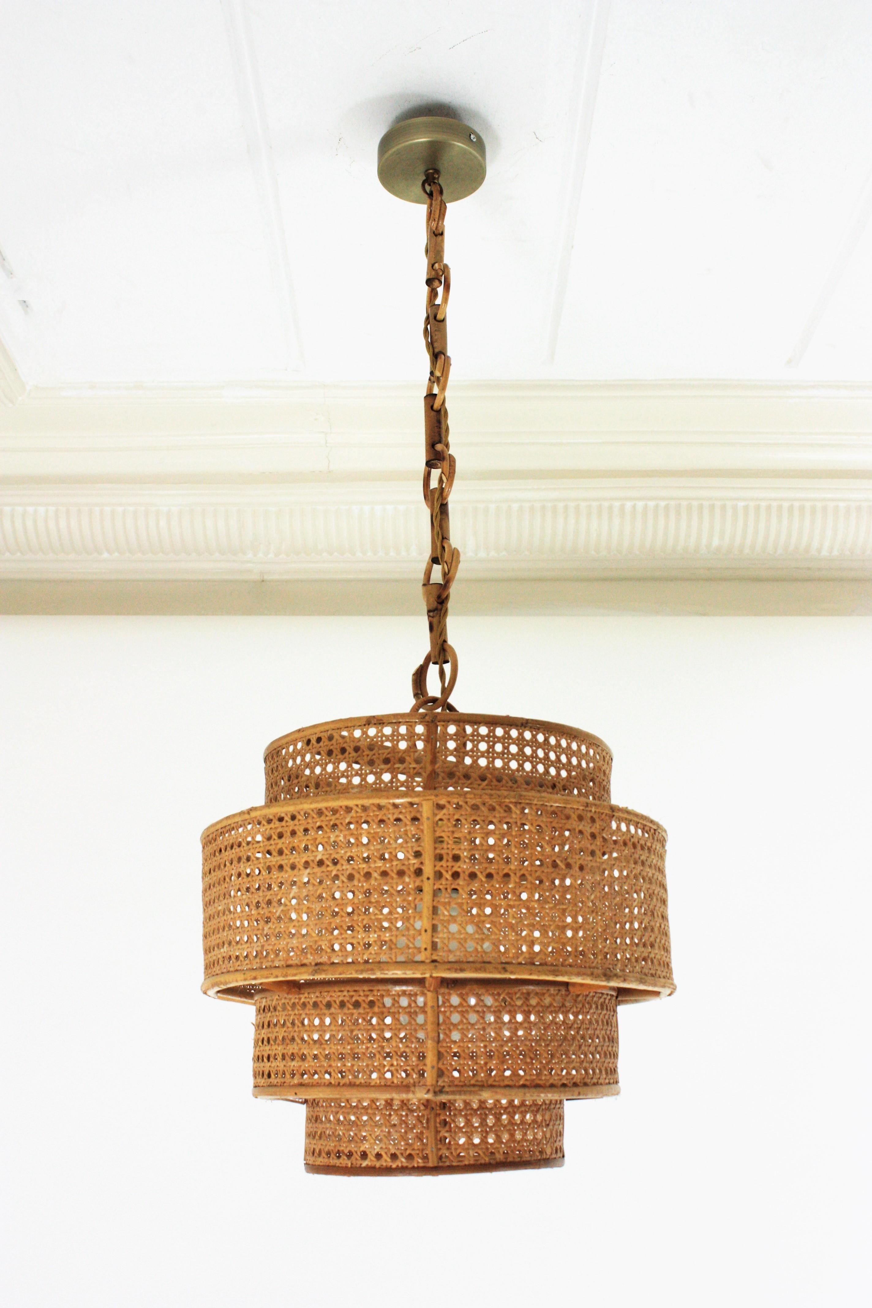 Hand-Crafted  Rattan Wicker Weave Concentric Cylinder Pendant Hanging Light, 1960s For Sale