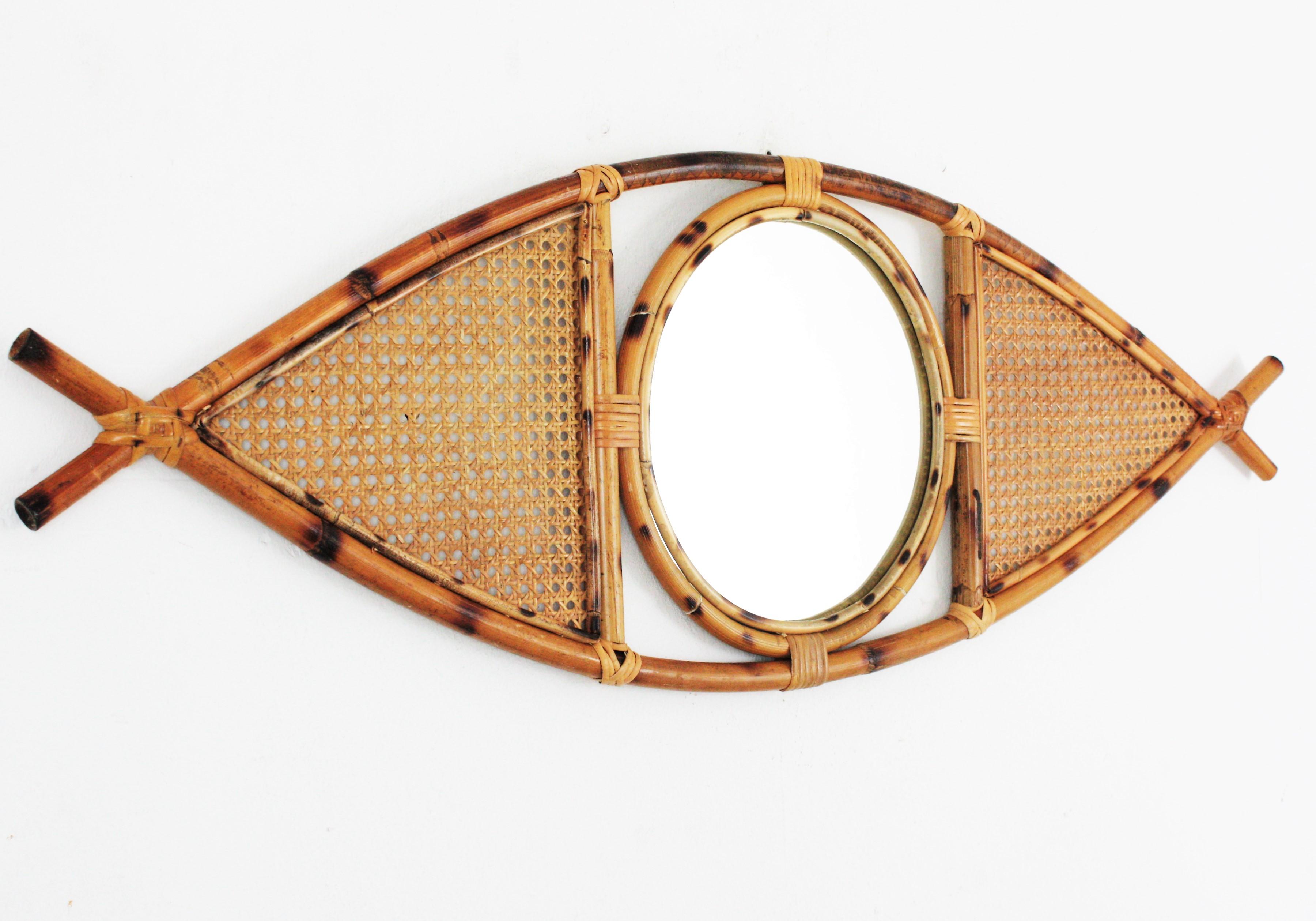 Hand-Crafted Rattan Wicker Eye Shaped Wall Mirror For Sale