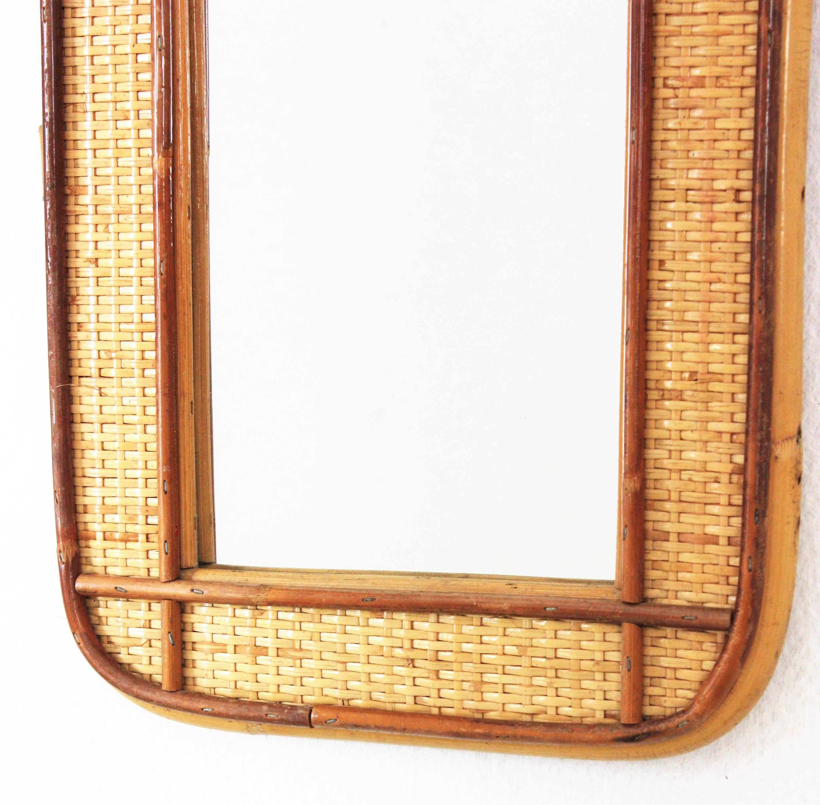 Hand-Crafted Rattan Woven Wicker Wall Mirror with Arched Top For Sale