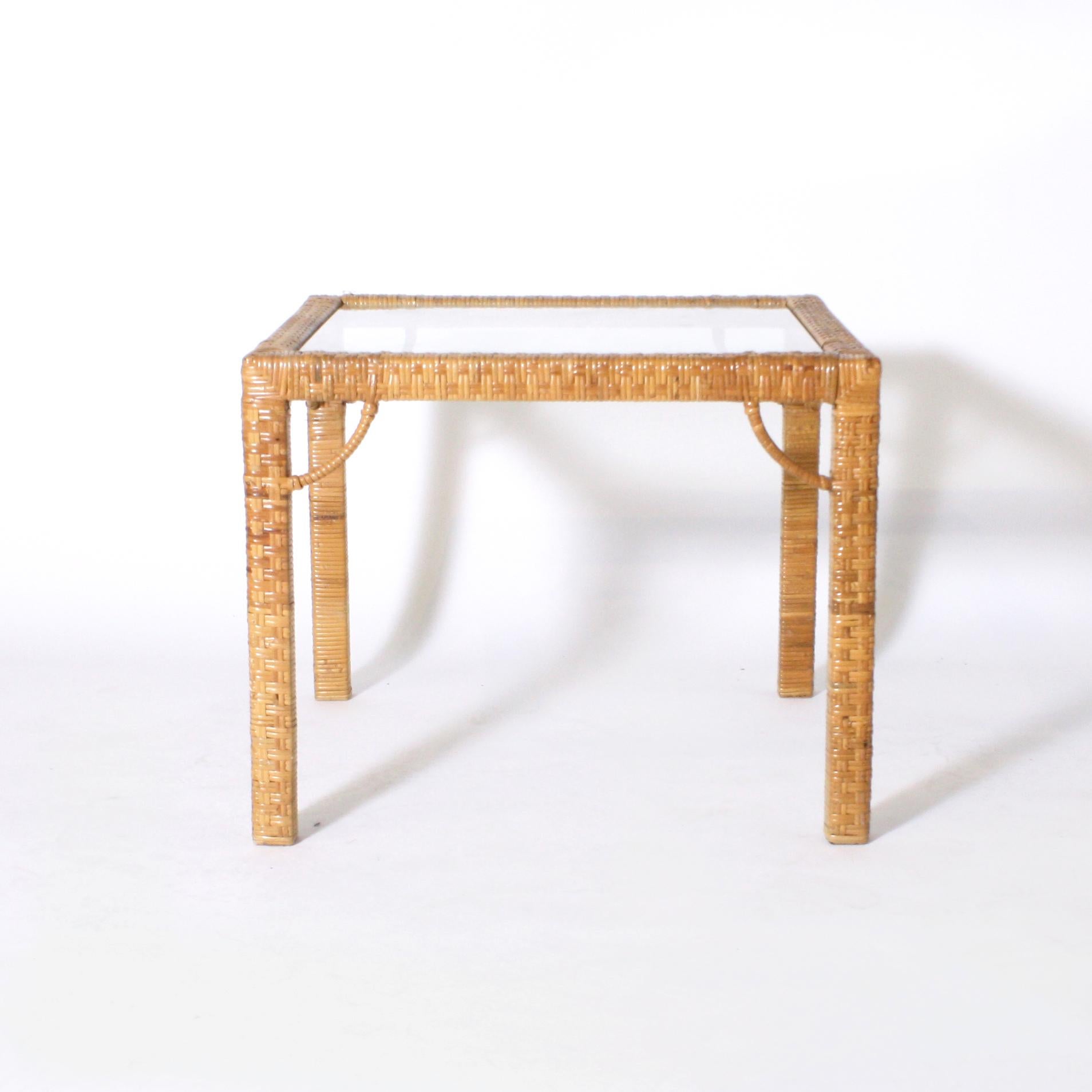Rattan wrapped side table in the style of Billy Baldwin.