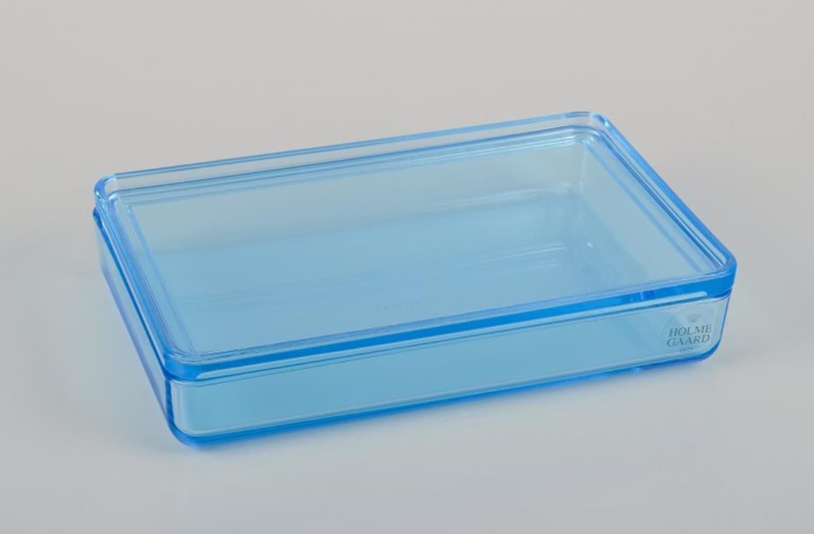 Rauff & Møldrup for Holmegaard. 
Set of four Thurø storage boxes in turquoise blue art glass. 
Winner of the RED DOT Design Award 2008 for the Thurø Line.
In perfect condition.
Label.
Dimensions: 16.0 cm x 10.0 cm x 3.5 cm.







