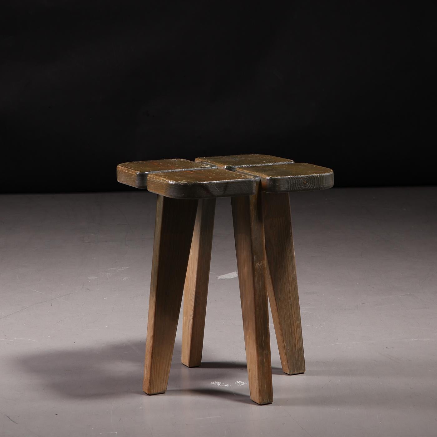 'Apila' stool, designed by Rauni Peippo in 1955. Produced by Keravan Puusepäntehdas for Oy Stockmann AB in Finland, 1960s. Made from dark green-lacquered pine. In original condition, with wear consistent with age and use. Underside numbered