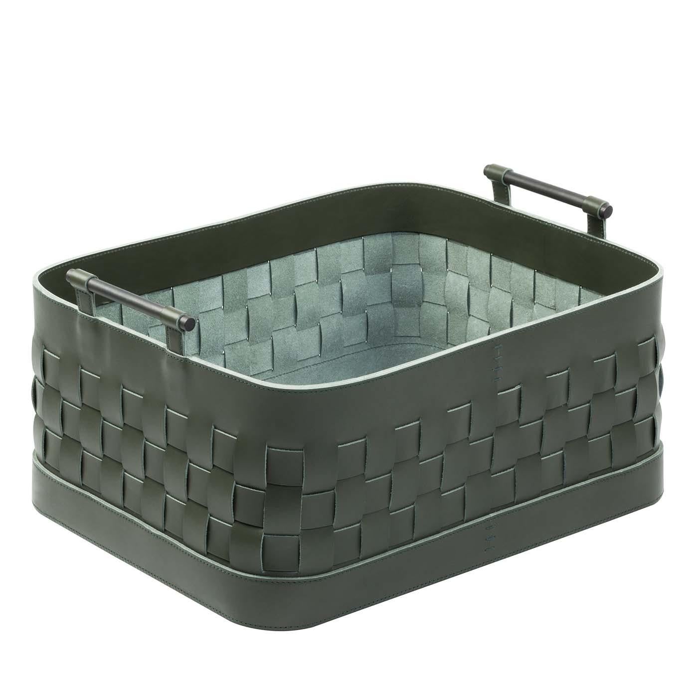 Part of the Ravenna collection, this rectangular basket is a versatile object of functional decor that will provide precious storage and display space, while also adding a striking decorative accent to a modern interior. Best showcased in a living