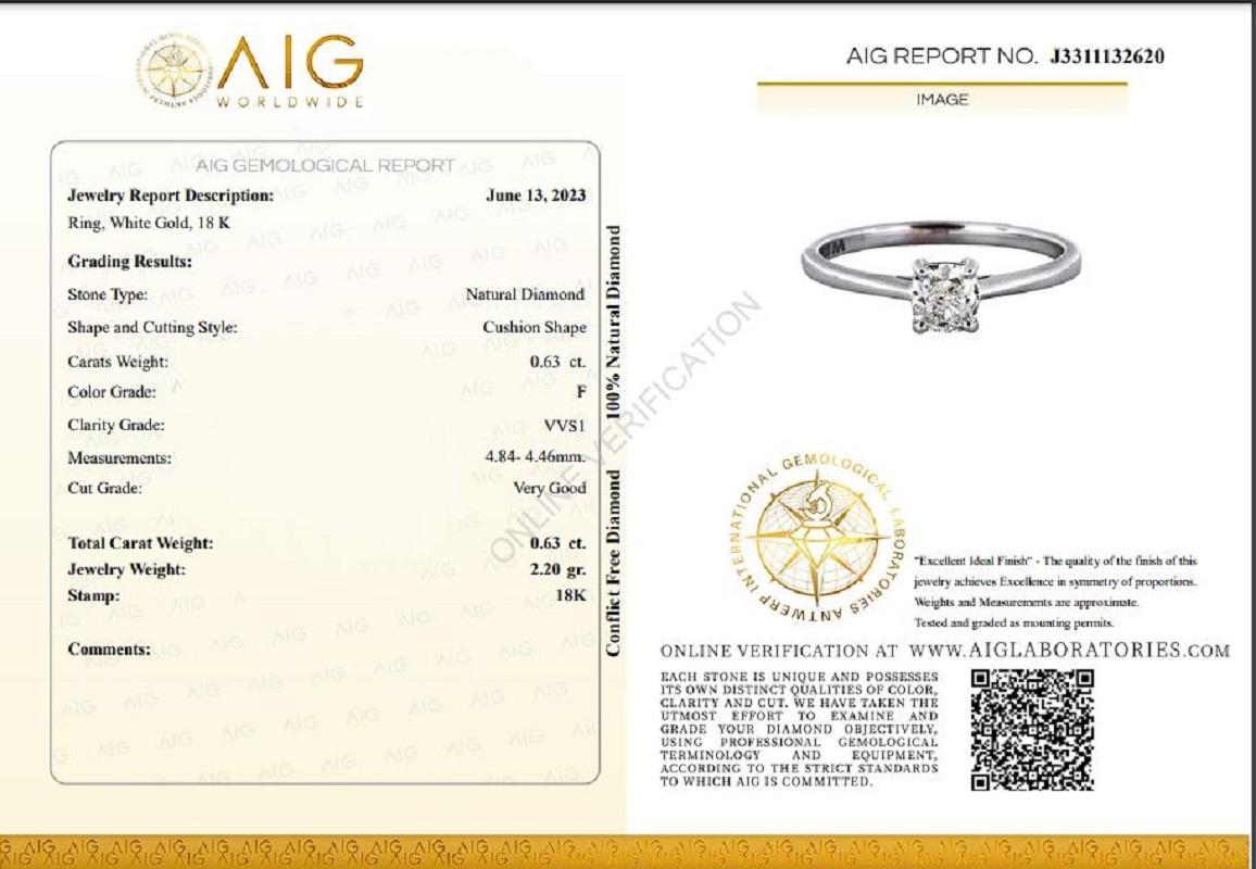 A stylish unique ring with a dazzling 0.25-carat round brilliant natural diamond. It has 0.2 carats of side diamonds which add more to its elegance. The jewelry is made of 18K White with a high-quality polish. It comes with an AIG certificate and a