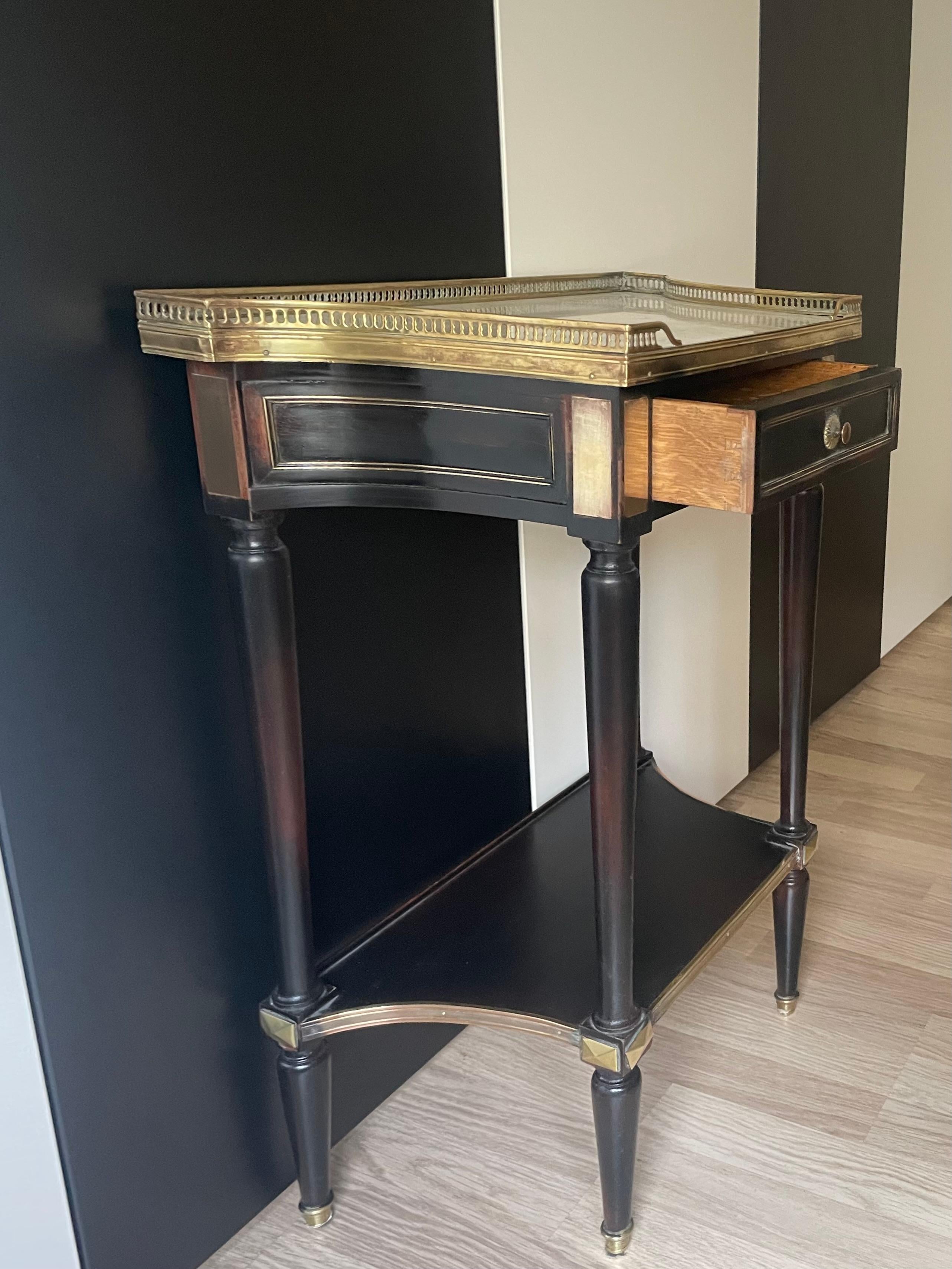 Louis XVI Ravishing Black Lacquer Two-Tier Console Table by Maison Jansen, France 1950. For Sale
