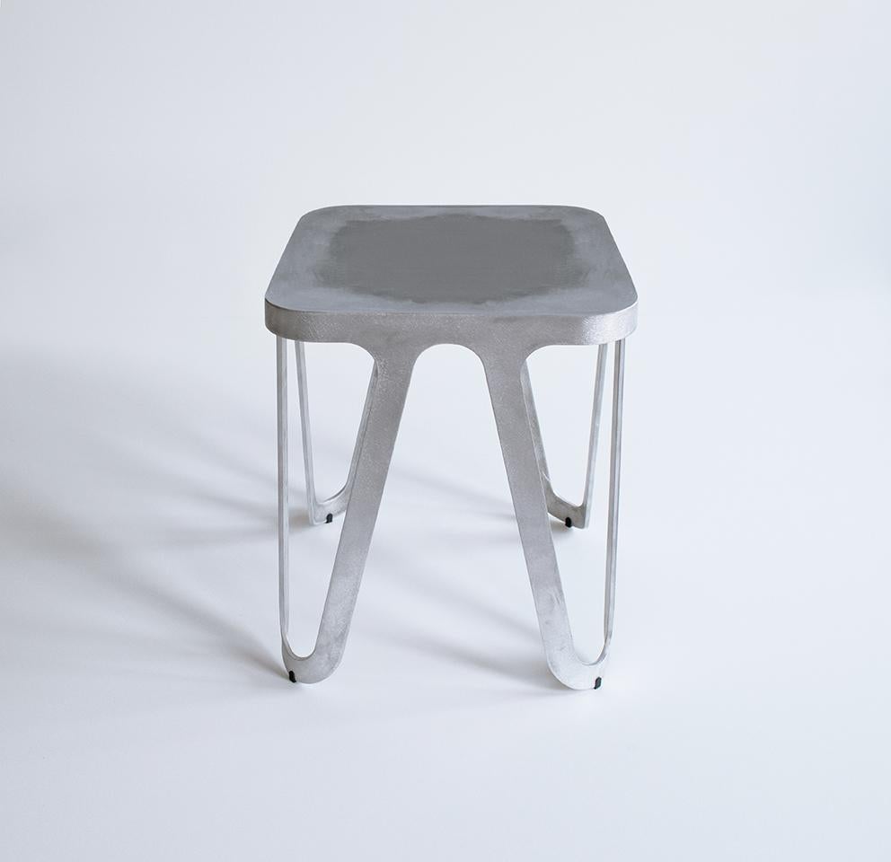 Raw Aluminium loop stool by Sebastian Scherer
Dimensions: D38 x W38 x H44 cm
Material: Aluminium
Weight 3.5 kg
Also available in wood.
Also available in colours: snow white / light sand / sun yellow / clay orange / rust red / space blue /