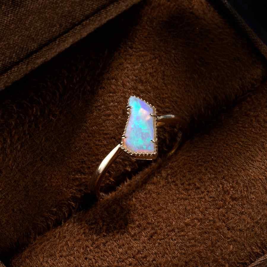 Raw Australian Solid Opal Engagement Ring 18K Yellow Gold.


Free Domestic USPS First Class Shipping!  Free One Year Limited Warranty!  Free Gift Bag or Box with every order!



Opal—the queen of gemstones, is one of the most beautiful and rarest