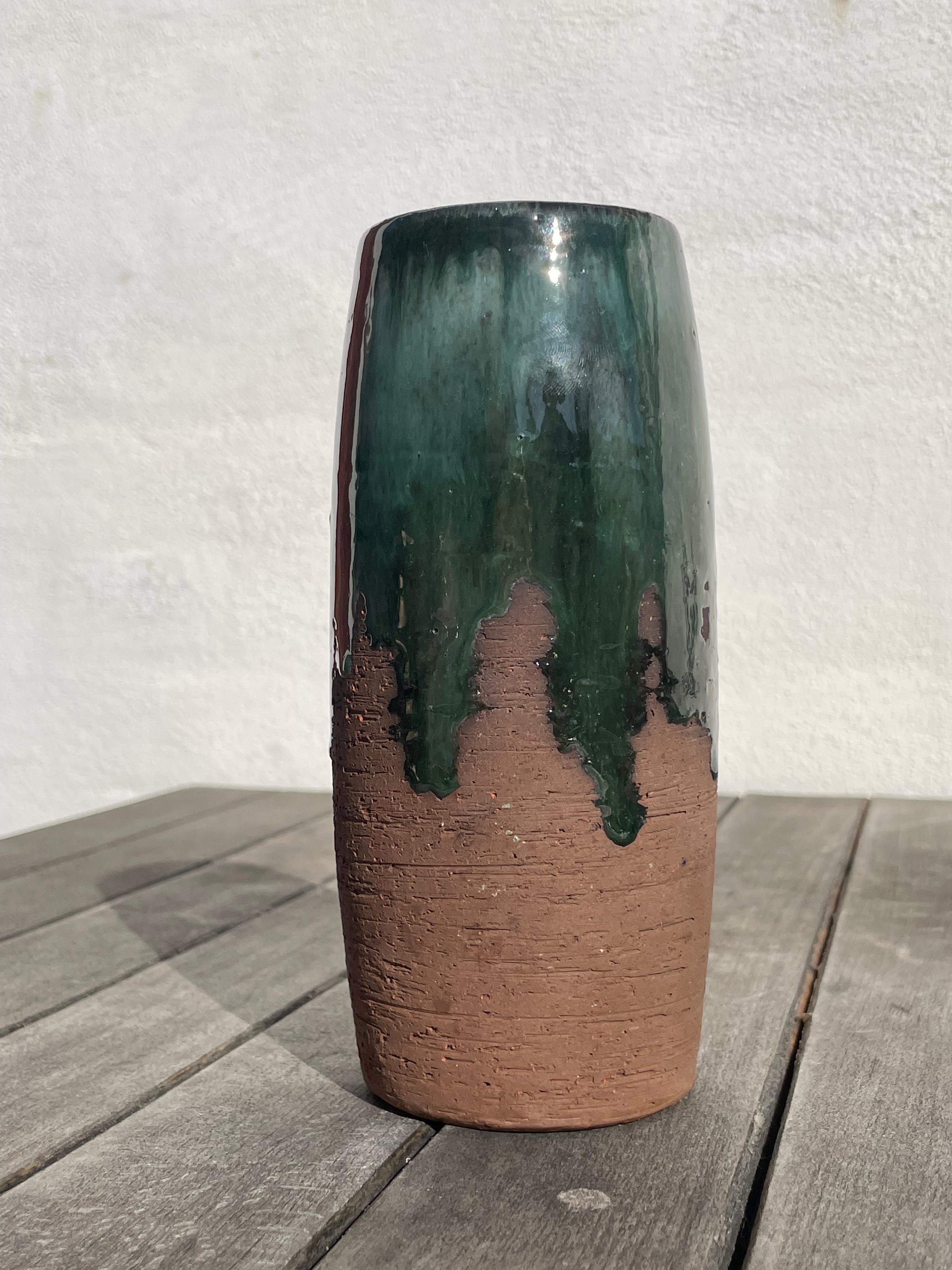 Shiny dark forest green and light blue colored glaze running down over raw dark brown chamotte clay. Designed and hand-crafted by Danish designer Robert Bentsen in the late 1960s. Signed under base. A unique, rustic Scandinavian modern piece in