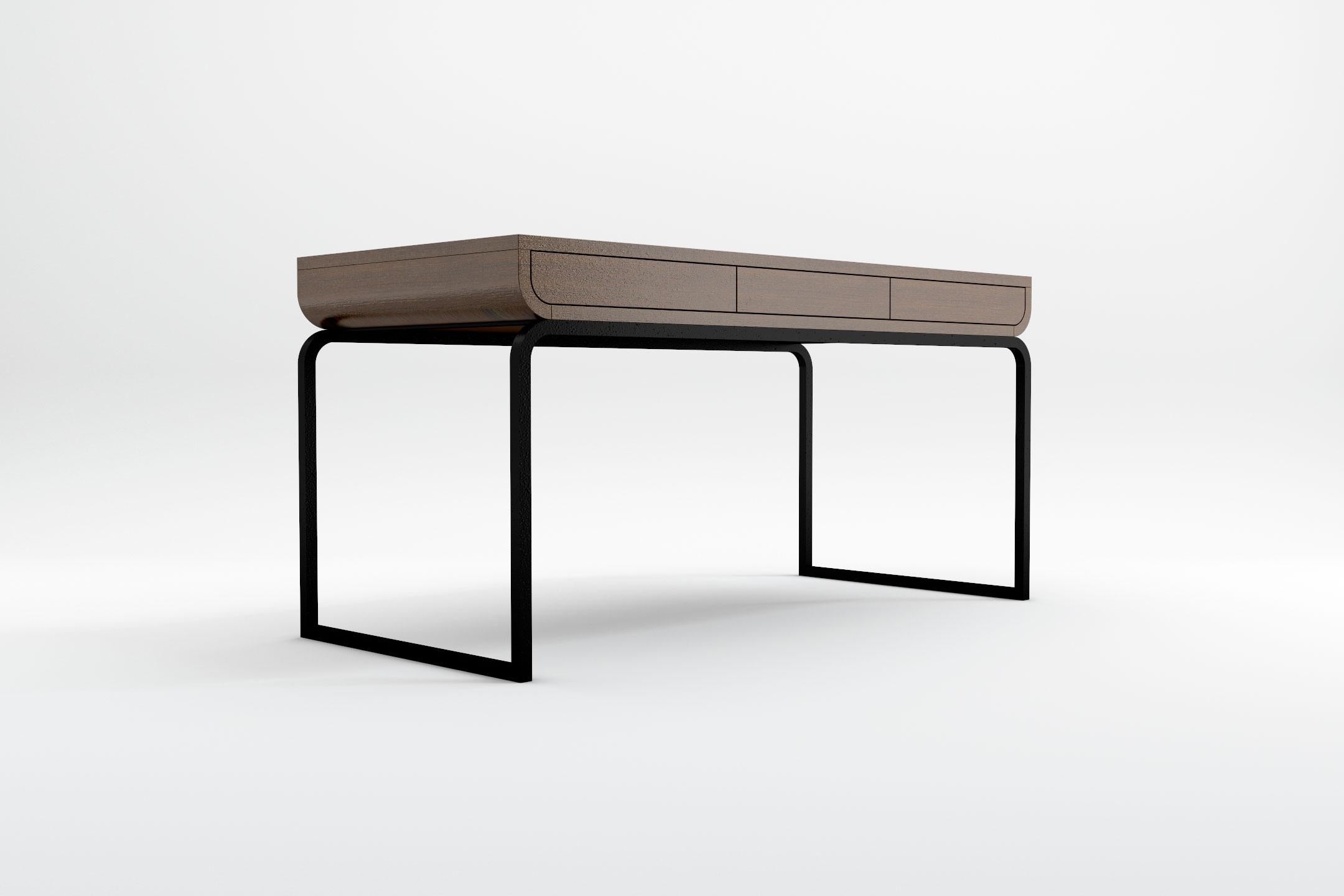 Intertwining wood and wrought iron, the sculptural lines of the Raw collection combine exquisite natural materials with modern Scandinavian shapes to create a breathtaking and unique design. The desk comprises a set of three drawers with push-open