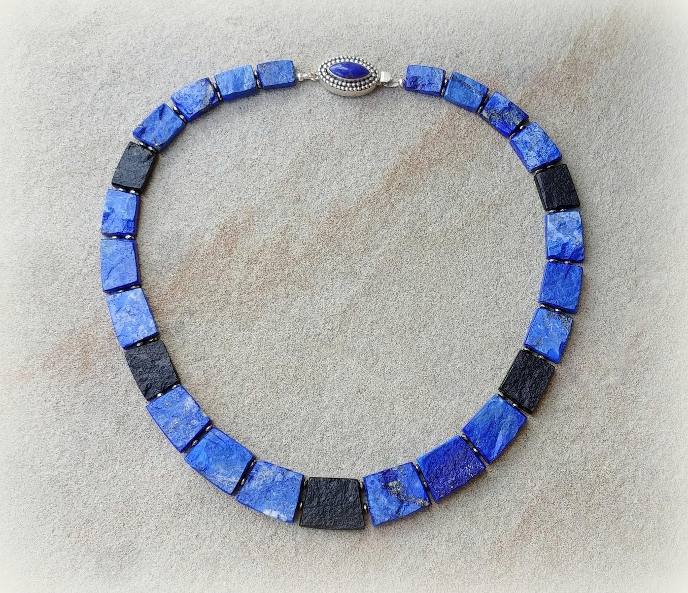 Stunning one-of-a-kind necklace made with high-quality deep blue Afghan lapis lazuli nuggets with inclusions of gold pyrite and high-quality Brazilian black tourmaline (Schorl). The size of the nuggets varies from 25mm x 20mm to 15mm x 12mm.