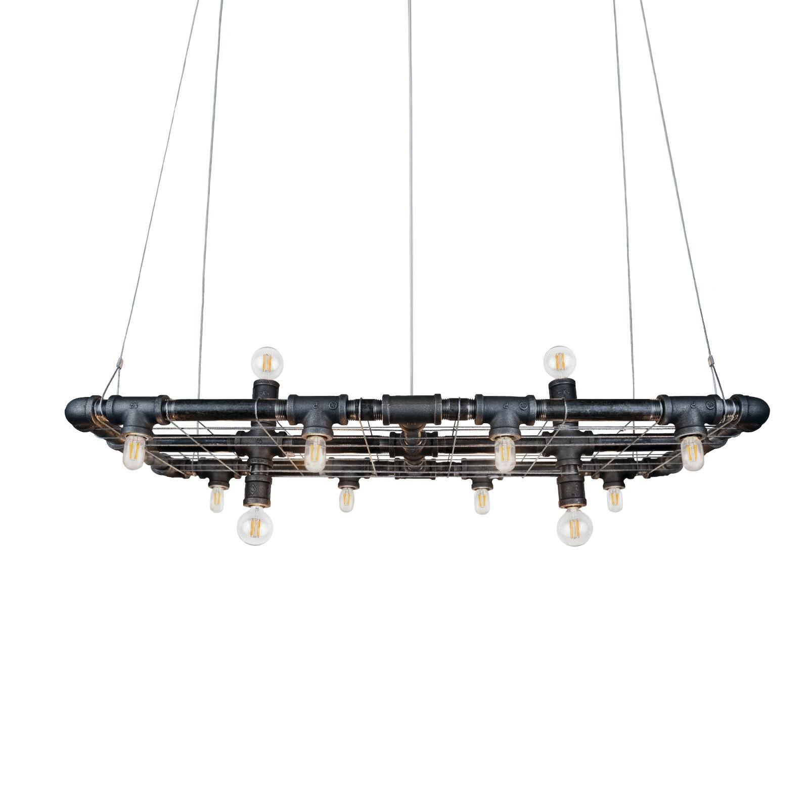 Raw mini-banqueting linear suspension by Michael McHale
Dimensions: D 28 x W 74 x H 25.5 cm.
Materials: steel, optically-pure gem-cut crystal.

20 x candelabra base CA7 bulb, either incandescent or LED

All our lamps can be wired according to