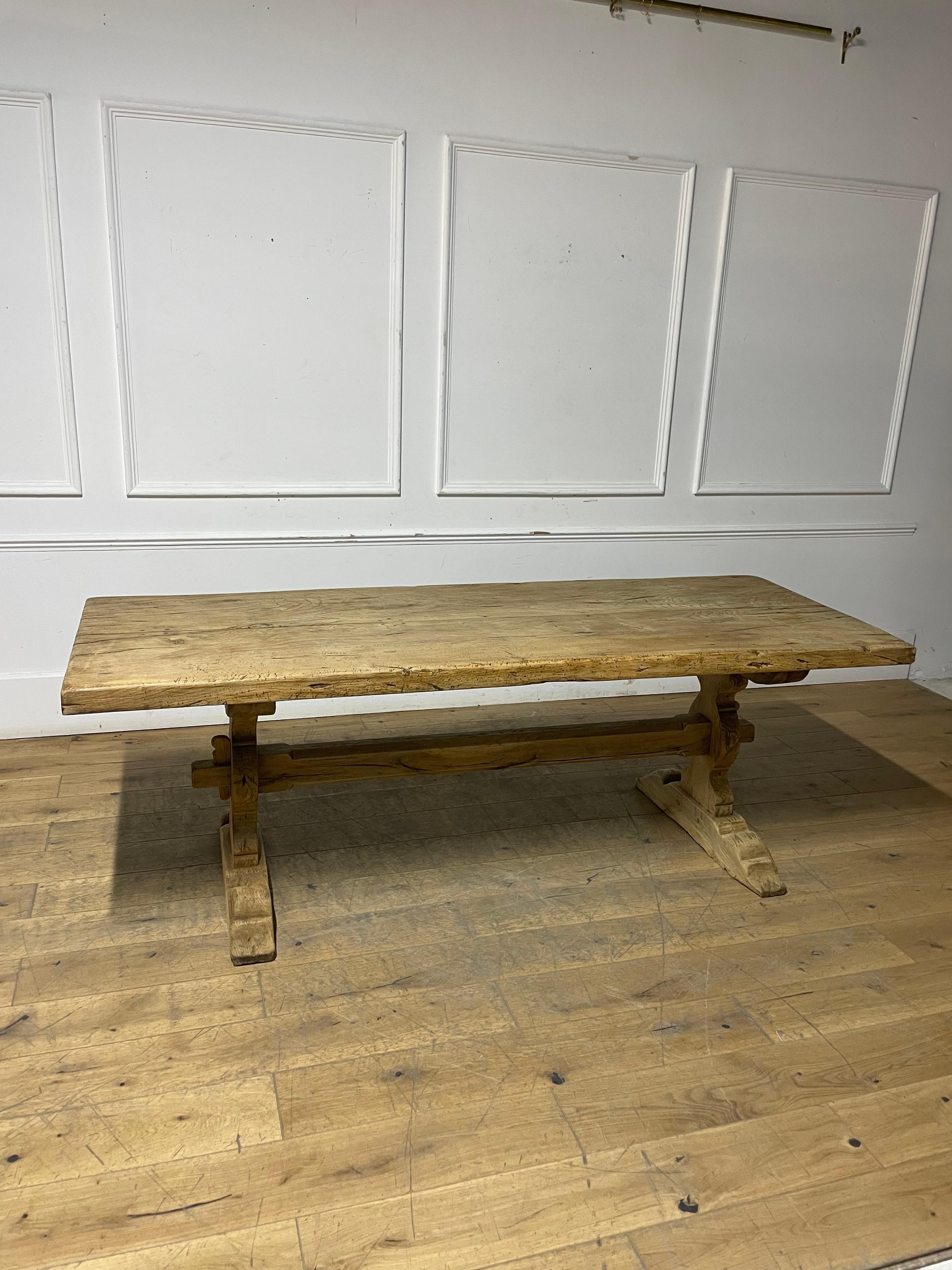 Great example of a mid 20th Century solid oak refectory table in the Louis XV style.

France, circa 1920’s

Constructed from solid oak, this piece has been washed and scrubbed to give it a contemporary feel.

The top comes off the base for ease of