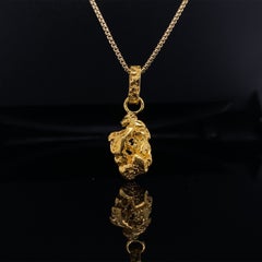 Nugget-Anhänger aus 24 Karat Gelbgold, massiver Nugget, 4,95 Gramm aus Australien