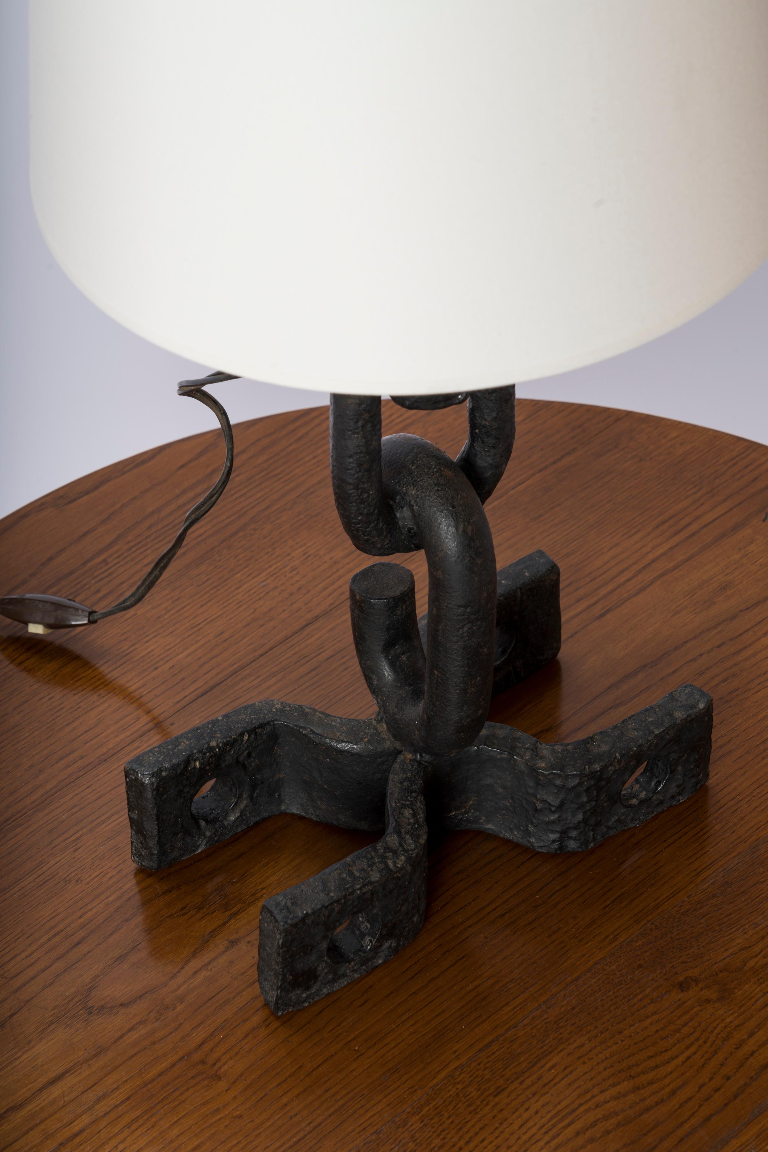 Graphic brutalist table lamp made of welded solid iron fittings. Very heavy. European socket and wiring. This lamp will ship from France and can be returned to either France or to a LIC NY location. Price does not include shipping nor possible