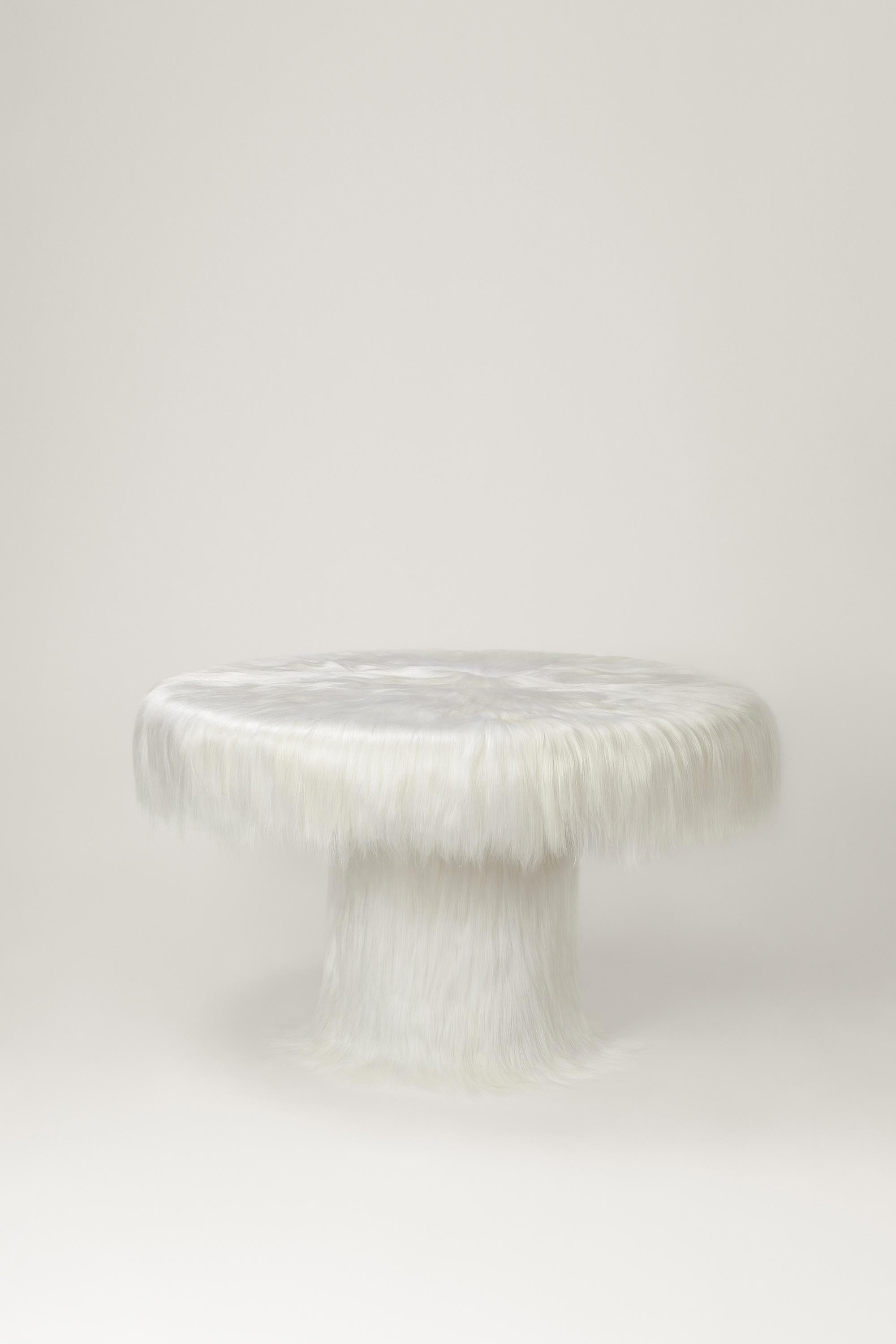 Raw Table by Atelier V&F
Limited Edition Of 5+2AP Pieces.
Dimensions: Ø 130 x H 76 cm.
Materials: Goatskin offcuts

Inspired by the earth goddess Gaia,「Revelation of Gaia」aims to explore the mighty but soft inner power and to praise the mysterious