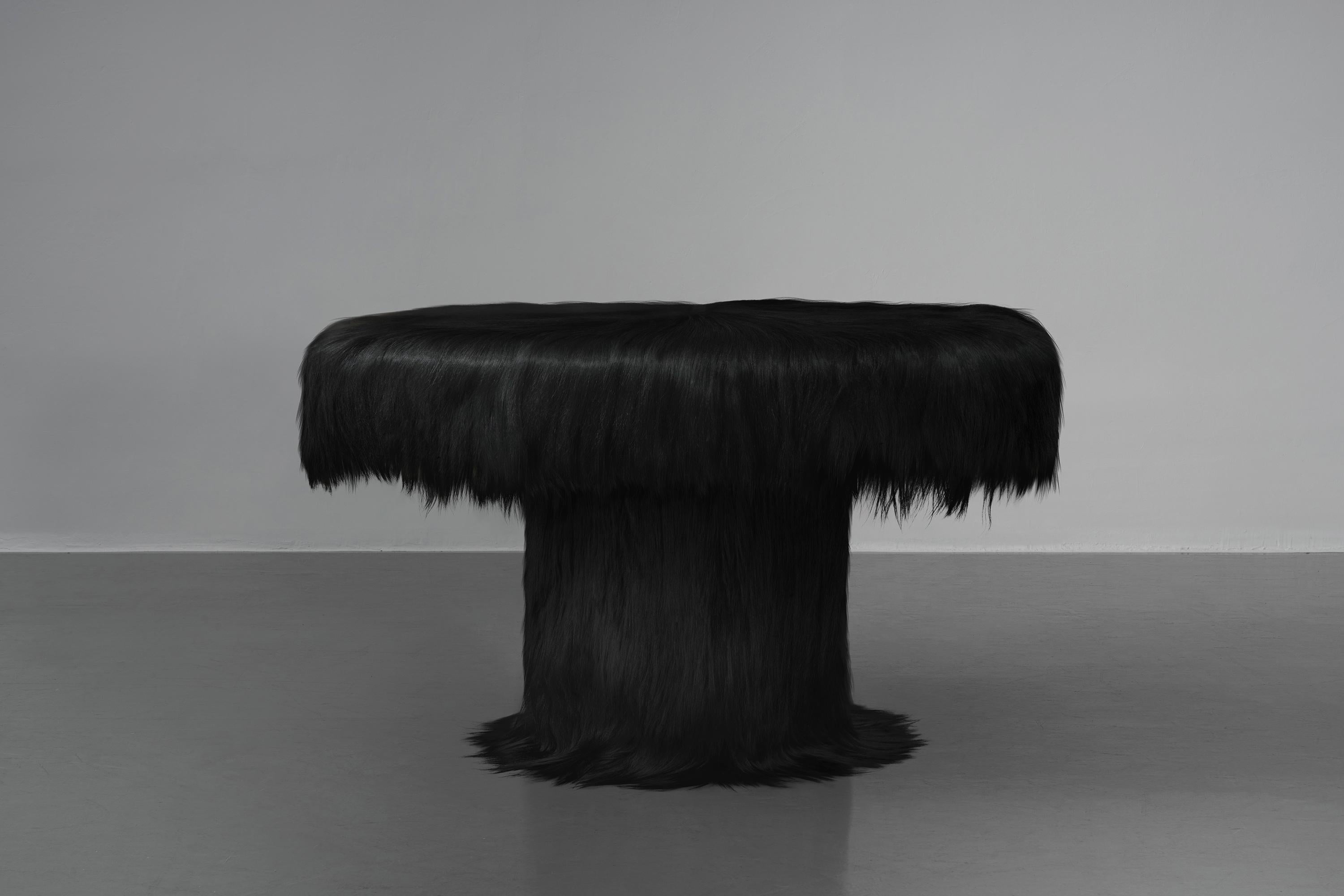 Raw Table by Atelier V&F
Limited Edition Of 5+2AP Pieces.
Dimensions: Ø 130 x H 76 cm.
Materials: Goatskin offcuts.

Inspired by the earth goddess Gaia,「Revelation of Gaia」aims to explore the mighty but soft inner power and to praise the mysterious