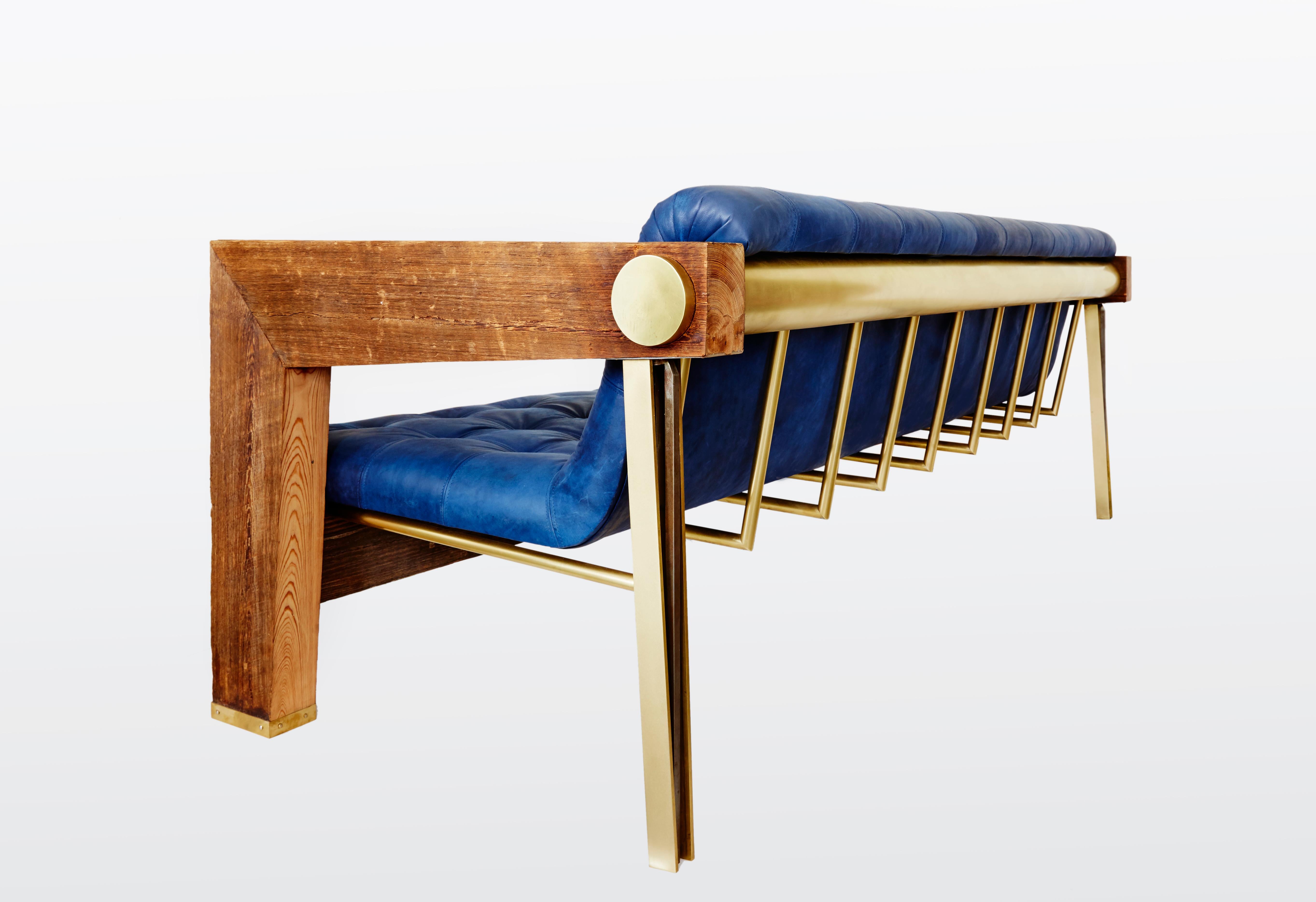 Rawdeco sofa in indigo dyed cow hide and pine by Cam Crockford 

Additional information:
Materials: Heart pine, burnished brass, indigo dyed cow hide
Dimensions: 81 W x 38 D x 36 H inches, seat height 14 inches.